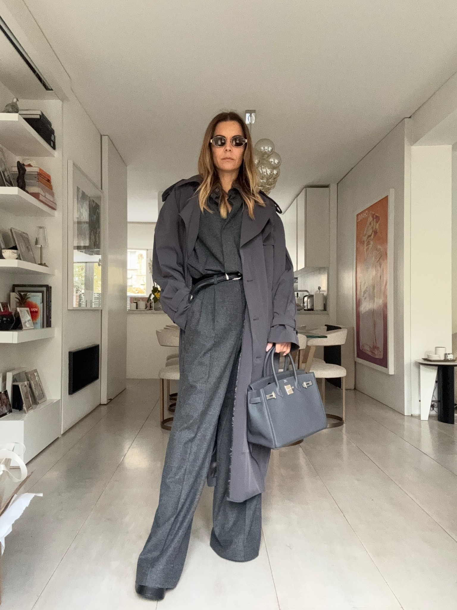 This Set runs very big, I’m wearing the 34 and it’s still big. The pants are super long and I am wearing the most massive platforms. So if you are tall these are amazing!!  The trench is MAMU STUDIOS , the Carrie Charcoal trench comes in one size - I love the fit! 