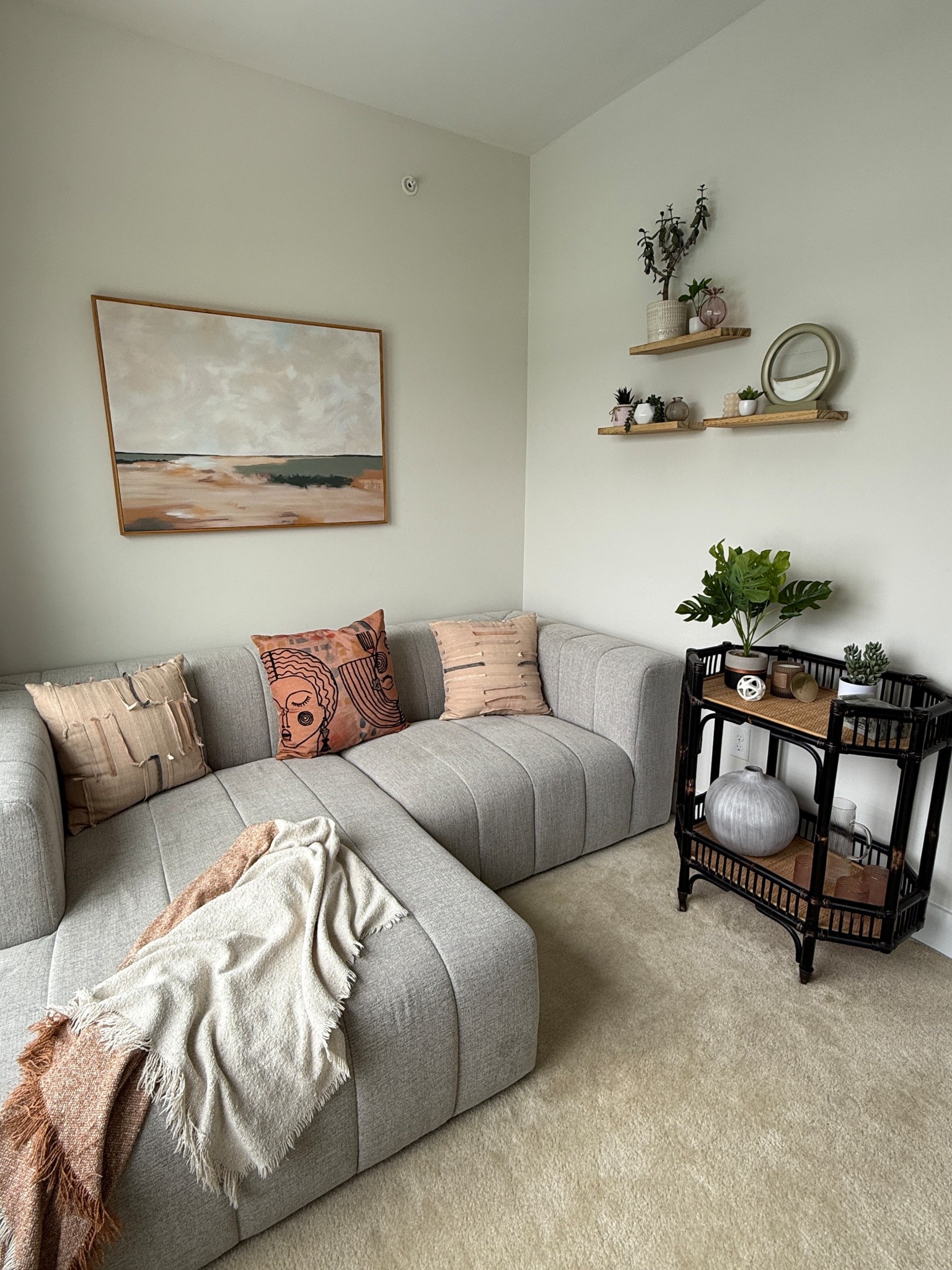 In our client’s primary bedroom seating area, we added the final layer of warmth and personality with a styled bar cart and thoughtfully curated shelves. These finishing touches bring balance, texture, and a touch of everyday luxury to the space.
