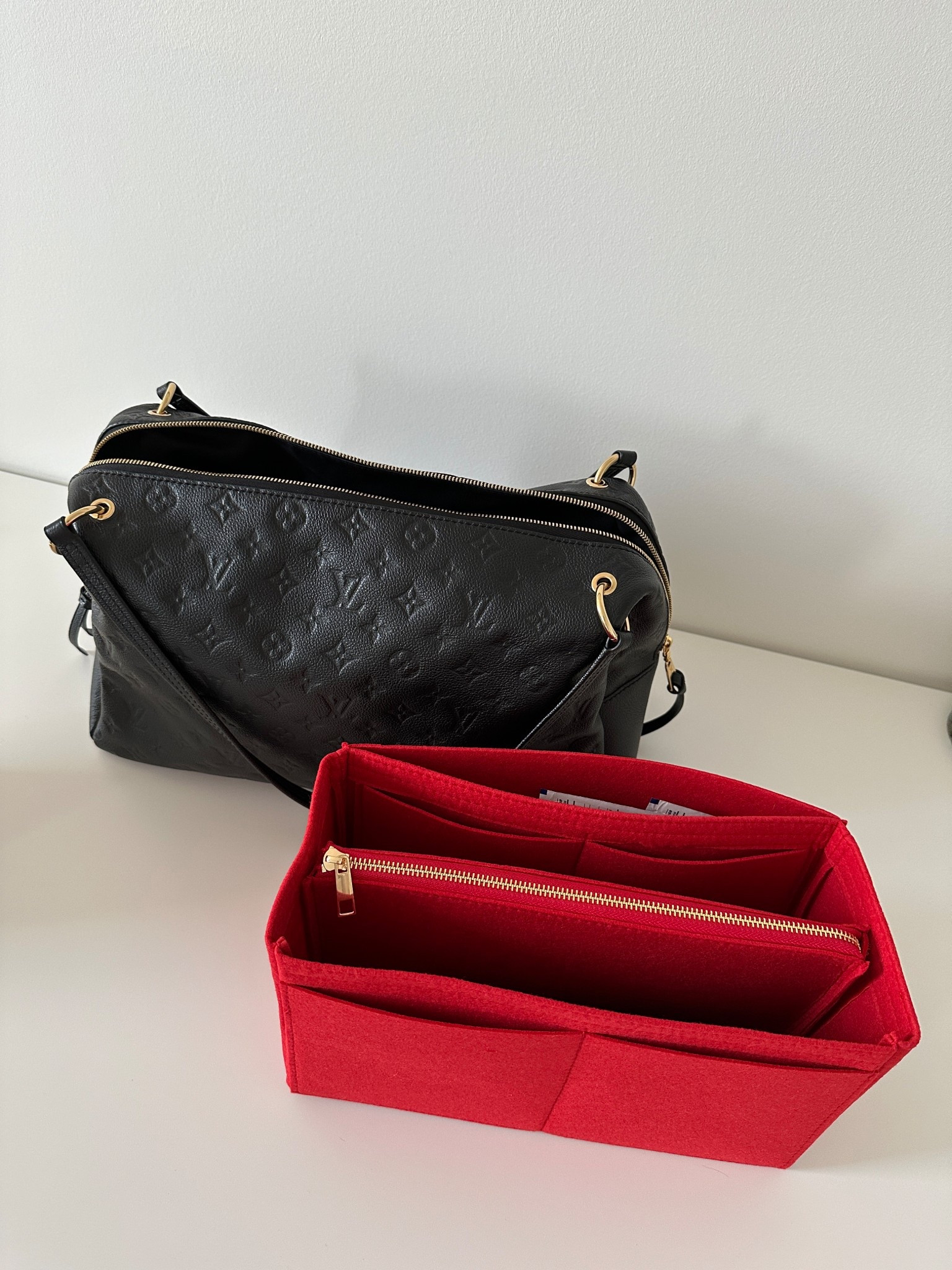 This is my second bag insert from this Etsy seller. Quality is ⭐️⭐️⭐️⭐️⭐️. The zipper runs nice & smooth. She has inserts for any size bags & she will customize to your desires  I had this one made without pockets on outside of zipper pouch. 


#LTKHoliday #LTKFindsUnder50 #LTKmomlife