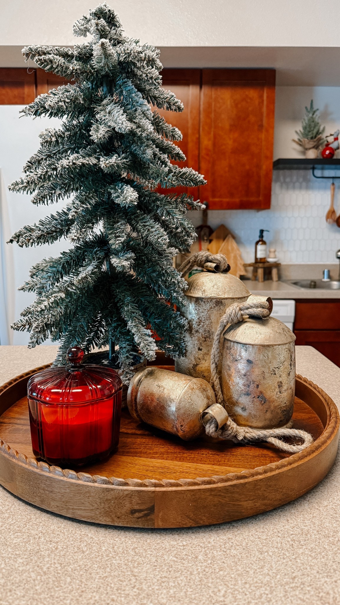 Every year I think I need to start fresh… and then I remember how much I love taking the pieces I already have and giving them new life. ✨

This little island setup is simple — just a tree I’ve had for years, a few rustic bells, and a warm red candle — but somehow it feels brand new.

That’s the fun part of Christmas decorating… you don’t always need something new. Sometimes it’s just styling it differently, moving things around, or mixing in one special piece to make everything feel cozy again. 🤎🎄

#LTKHoliday #LTKSeasonal #LTKHome