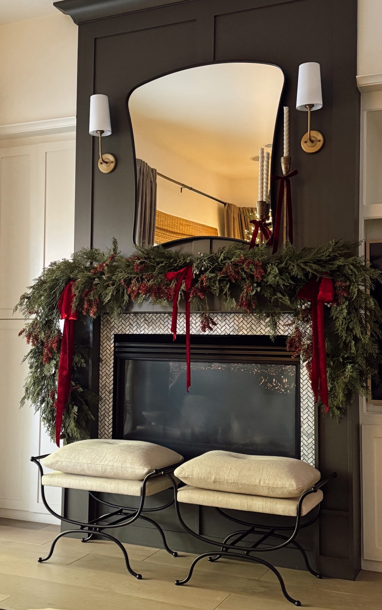 Holiday mantel progress and decor so far. 
I have two hemlock garlands here with juniper berry stems and dried hops stems throughout.

Ralph Lauren Christmas decor 

#LTKHome #LTKHoliday #LTKCyberWeek
