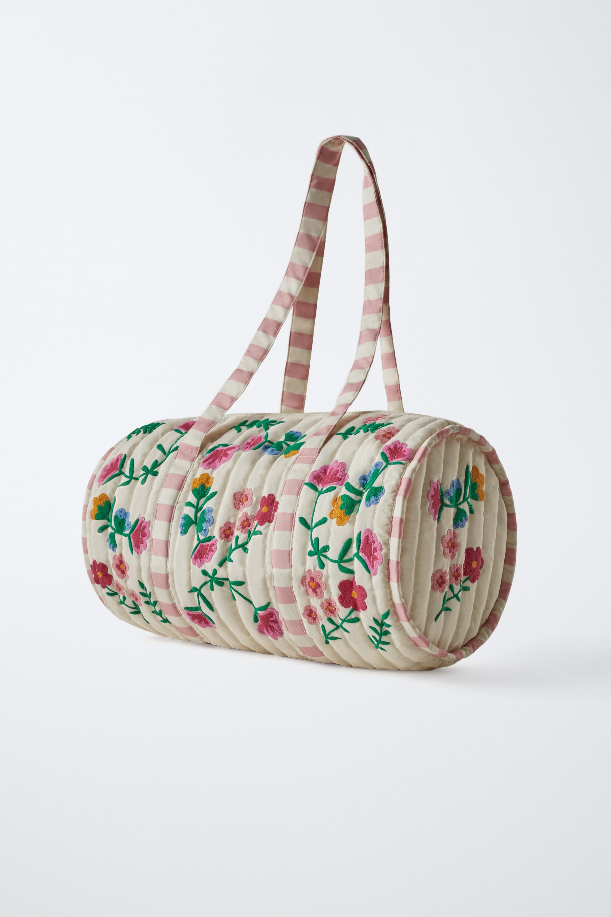 Bowling bag with floral embroidery. Zip closure. Double shoulder straps.Height x Length x Width: ... | Zara US