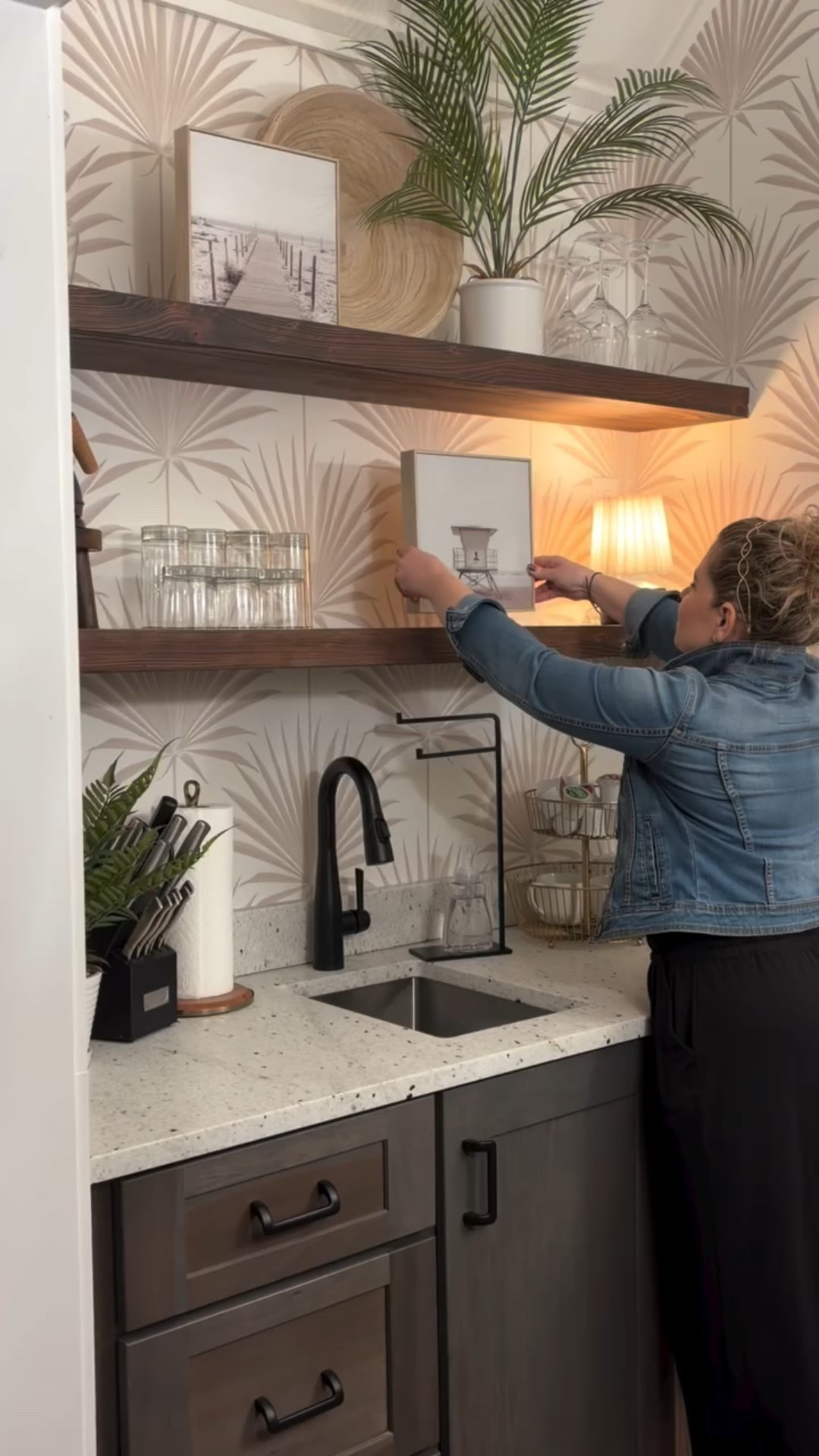 POV: You add one mini lamp and suddenly the whole nook glows.

Most kitchens feel flat because they’re missing layered lighting.

I styled this carriage house nook with:
• framed artwork for height
• a mini lamp for that warm dimmable glow
• simple stacked pieces for softness

Now it feels intentional. Not staged. Not cluttered. Just finished.

Lighting that finishes the room > every time.

#ShelfStyling
#KitchenLighting
#amandandcodesign


#LTKHome