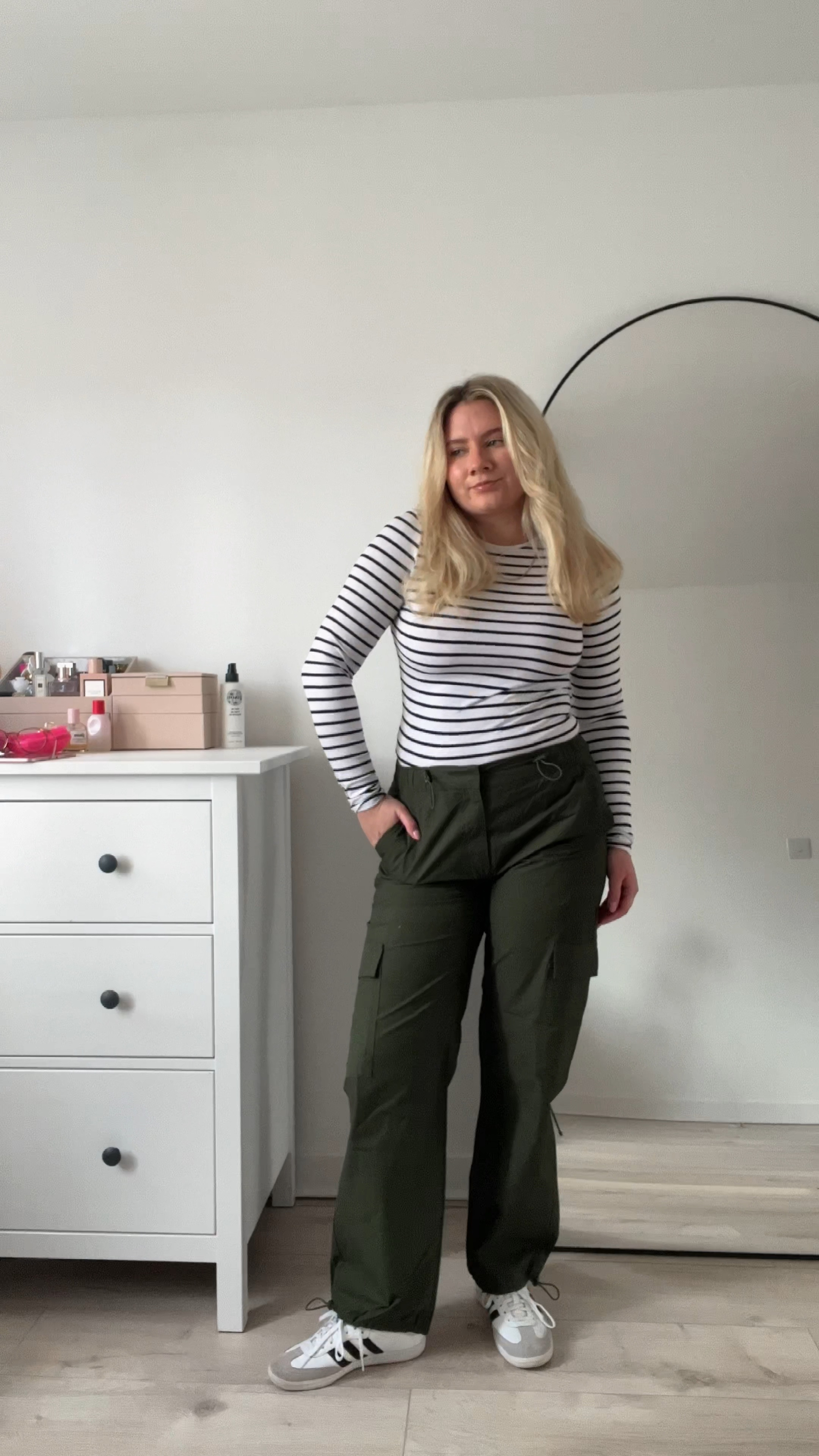 new look try on haul with a striped black & white long sleeve bodysuit, khaki cargo trousers, a knit cream sweater, quilted puffer jacket, grey v neck rib knit midi dress, and a black mini shift dress 🖤

#LTKstyletip #LTKeurope #LTKSeasonal
