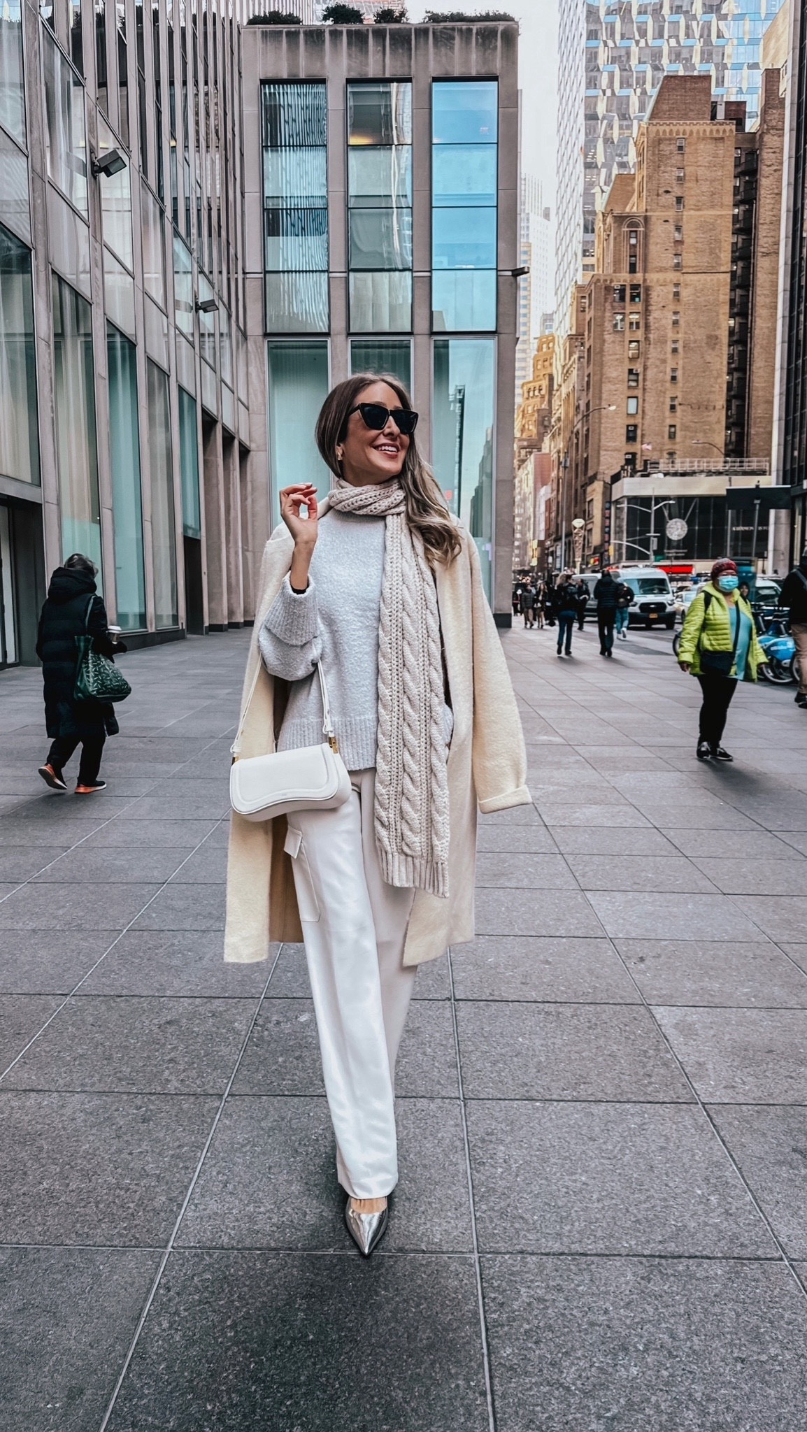 Neutral classy and elegant outfit that I wore in New York.
These heels are my new purchase, they are so so beautiful and comfortable. This sweater is from Amazon and I love it in gray, so cozy and stylish. The scarf is also from Amazon and I love the details. This bag is so pretty and it definitely elevates any neutral outfit. This cardigan/coat from Revolve is so chic and comfortable.
Everything fits true to size, I am wearing a size small.

#LTKU #LTKstyletip #LTKSeasonal