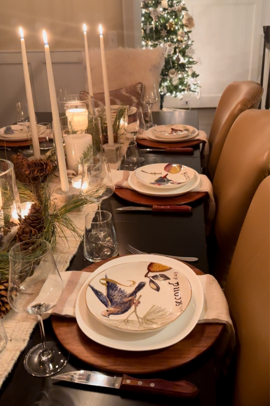 Christmas dinner tablescape, taper candles are white color
The plates are 12 days of Christmas plates from Williams Sonoma a long time ago.. linked similar ones!