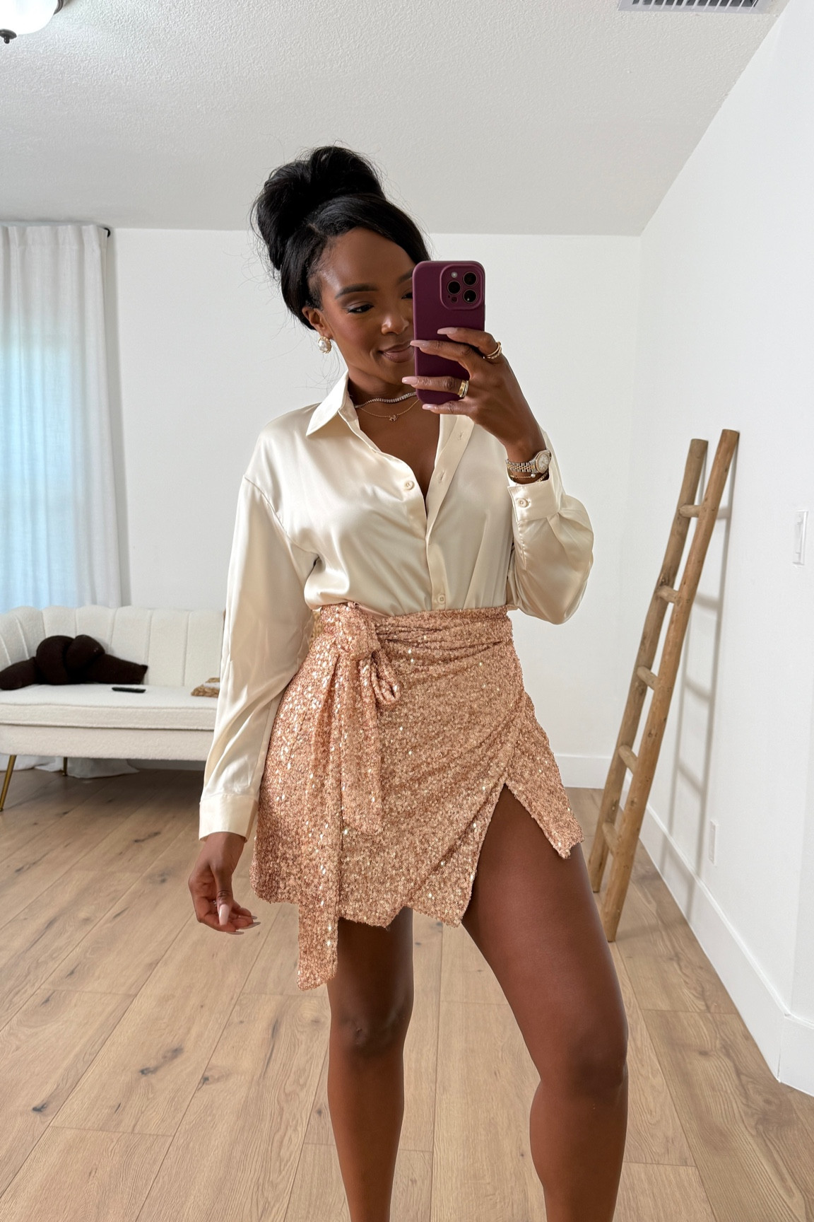 Elevate your holiday style with this timeless and elegant combination: a silky ivory button-down blouse paired with a shimmering rose gold sequin wrap skirt featuring a flattering tie detail and side slit. This look is perfect for Christmas celebrations, New Year’s Eve parties, or any festive gathering where you want to shine. Shop this polished and glamorous outfit on #LTK to make a statement this season. #HolidayFashion #SequinSkirt #EffortlessChic #LTKStyle

|•Size small I’m 5’4 | 140lbs | 36D -27 -40  IG & YT: kirasfashionfinds TT: kiraabboud•|