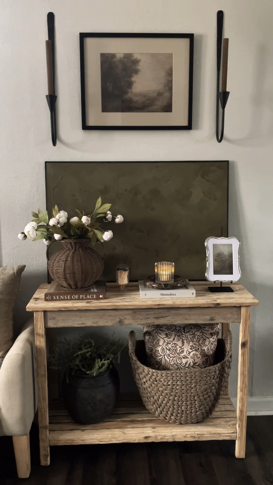 Accent table refresh🤍

It feels so nice to have Winter put away and have some every day decor out. I used to have my gold ornate mirrors paired together here but I decided I wanted to change the look up in this space. I removed them and added this large moody green lime wash art that I painted last year. It ties in so nicely with the picture and candle sconces above while also tying in nicely with everything on the accent table, acting as a background for the decor. To me, it looks like stacked art work which you would normally see on a wall so I liked the idea of leaning it on my accent table so it integrates well with what is going on above and below it. I haven’t really seen anyone do this so I thought it was unique and I am really loving it. Linked what I could🤎

#accenttablerefresh #interiordesign #stylingspaces #homedecor

#LTKHome