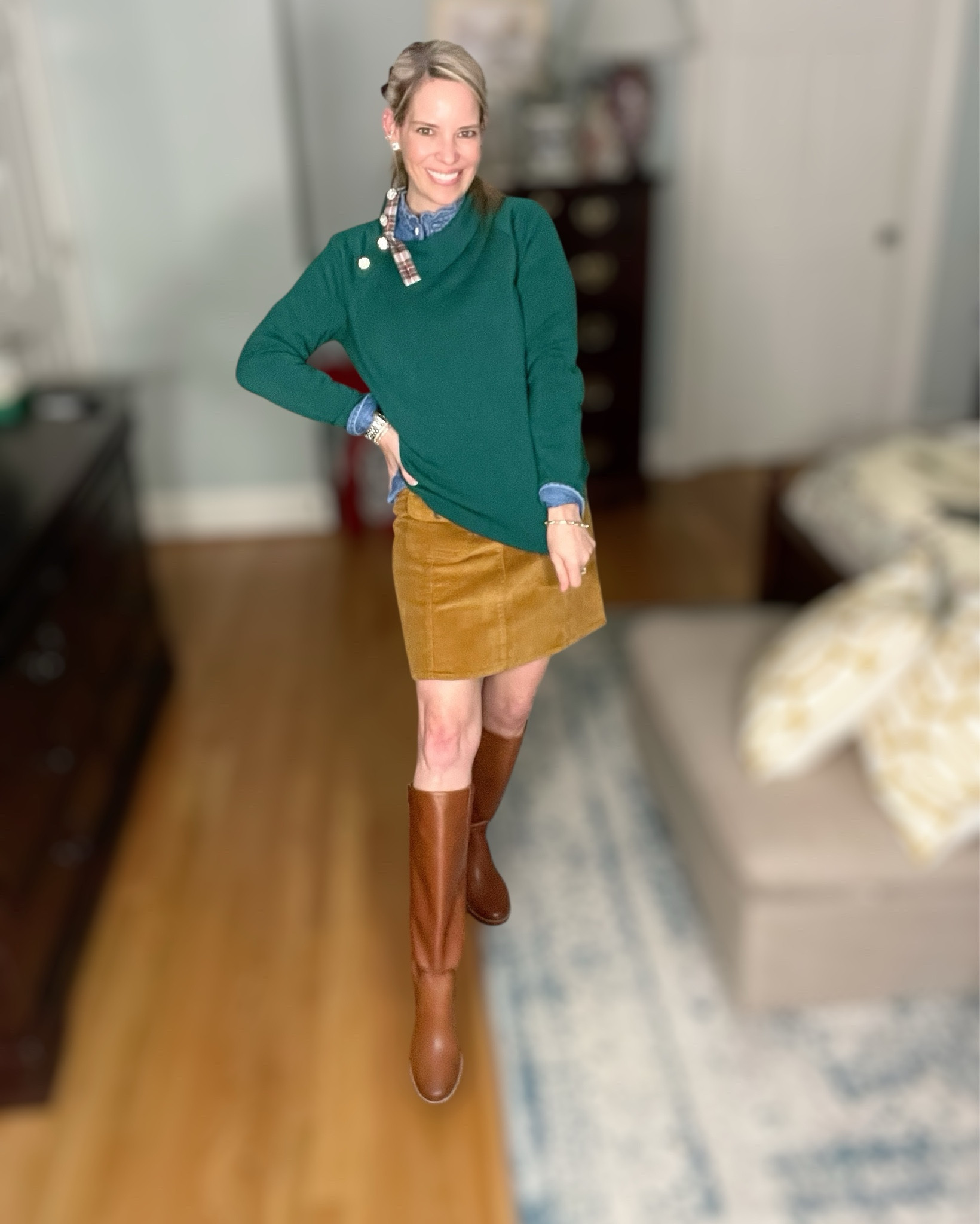 Holiday prep but make it cozy 🎁🍂 This green mockneck pullover has the sweetest little jeweled buttons that instantly elevate the whole outfit. I layered it over a soft chambray button-down for that classic winter texture mix, then paired with a corduroy mini skirt for warmth + contrast. Tall cognac boots to finish the look (always). And how fun are these festive ear cuffs + earrings for a subtle holiday sparkle? Perfect for holiday parties, school programs, cookie swaps, or festive errands.

Sizing:
• Sweater: wearing XS — true to size
• Denim shirt: wearing XS
• Corduroy mini skirt: wearing XS — easy fit
• Boots: true to size

⸻


preppy holiday outfit • cozy Christmas outfit • winter outfit ideas 2025 • festive casual style • corduroy mini skirt outfit • green holiday sweater • jewel button sweater styling • chambray layer outfit ideas • tall boots winter outfit • timeless winter fashion • holiday activities outfits • classic Christmas style inspiration • everyday holiday outfits for moms • elevated casual holiday look


#LTKHoliday #LTKSaleAlert #LTKShoeCrush

#LTKFindsUnder50 #LTKSaleAlert #LTKHoliday