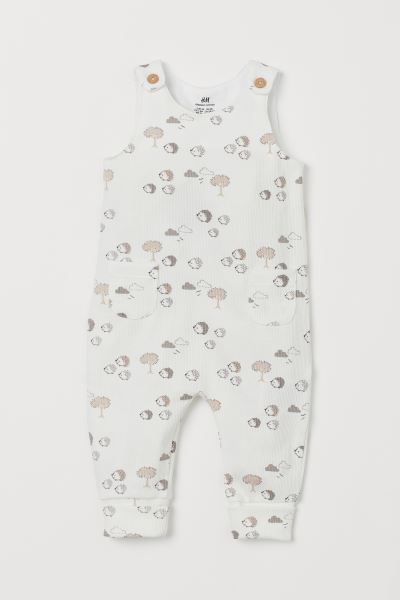 Sleeveless romper suit in ribbed, organic cotton jersey with a printed pattern. Wide shoulder str... | H&M (US + CA)