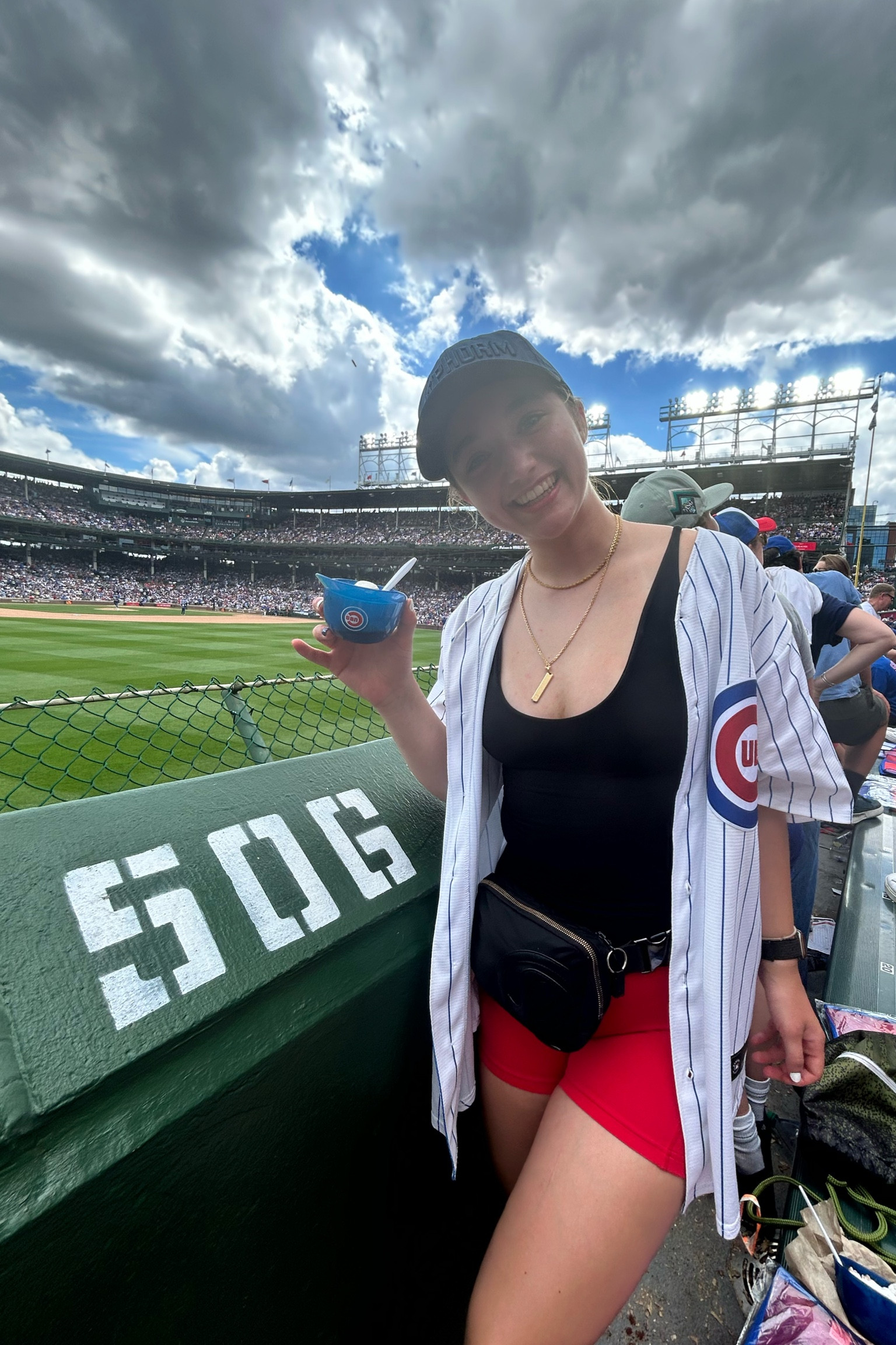 A cute Chicago Cubs baseball game outfit complete with the  jersey + Anthropologie tank and gym shark shorts + Lululemon Fanny pack 

#LTKActive #LTKStyleTip #LTKFitness