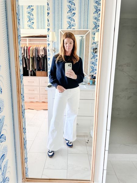 Chilly spring outfit, wide, leg, white denim with ankle fray, mother, denim, J.Crew sneakers, navy blue, navy and white sneakers, navy blue cotton sweater, sezane sweater, spring outfit, spring look, coastal outfit 

#LTKstyletip