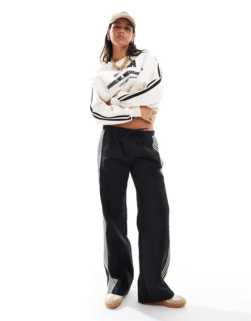 Pull&Bear side stripe wide leg nylon sweatpants in black | ASOS (Global)