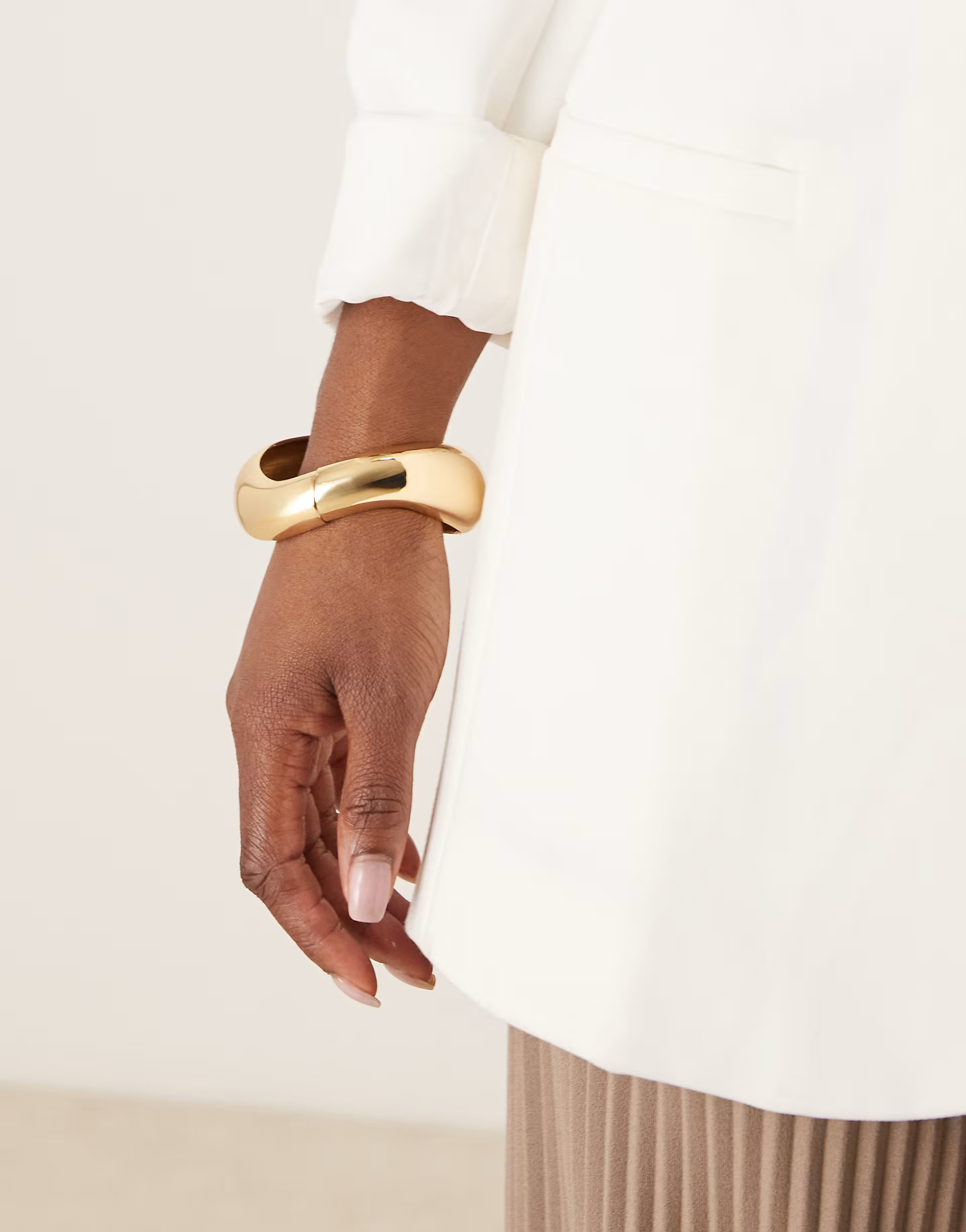 ASOS DESIGN cuff bracelet with twist design in gold | ASOS (Global)