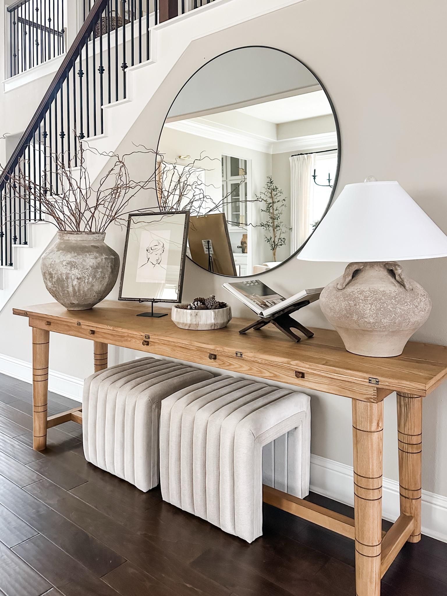 Entryway winter styling of my entryway. I styled my console table with some organic pieces - grabbed some dried looking branches from Amazon for an earthy organic look. 

#LTKStyleTip #LTKSaleAlert #LTKHome