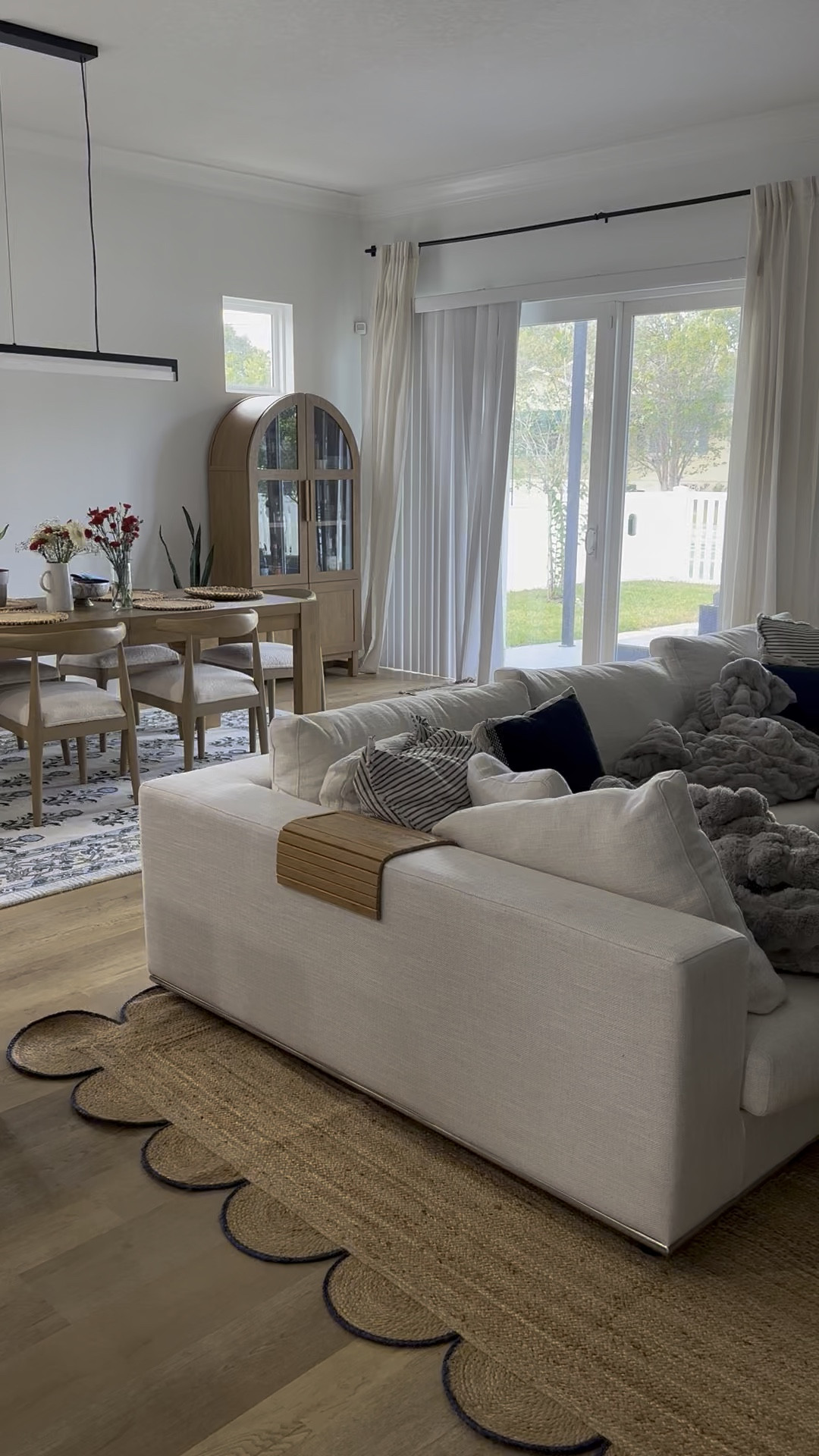 Amazon Scalloped Natural Jute Area Rug, Navy Trim, 11'x14. Living room rug. Jute rugs.

#LTKFindsUnder100 #LTKHome #LTKSaleAlert