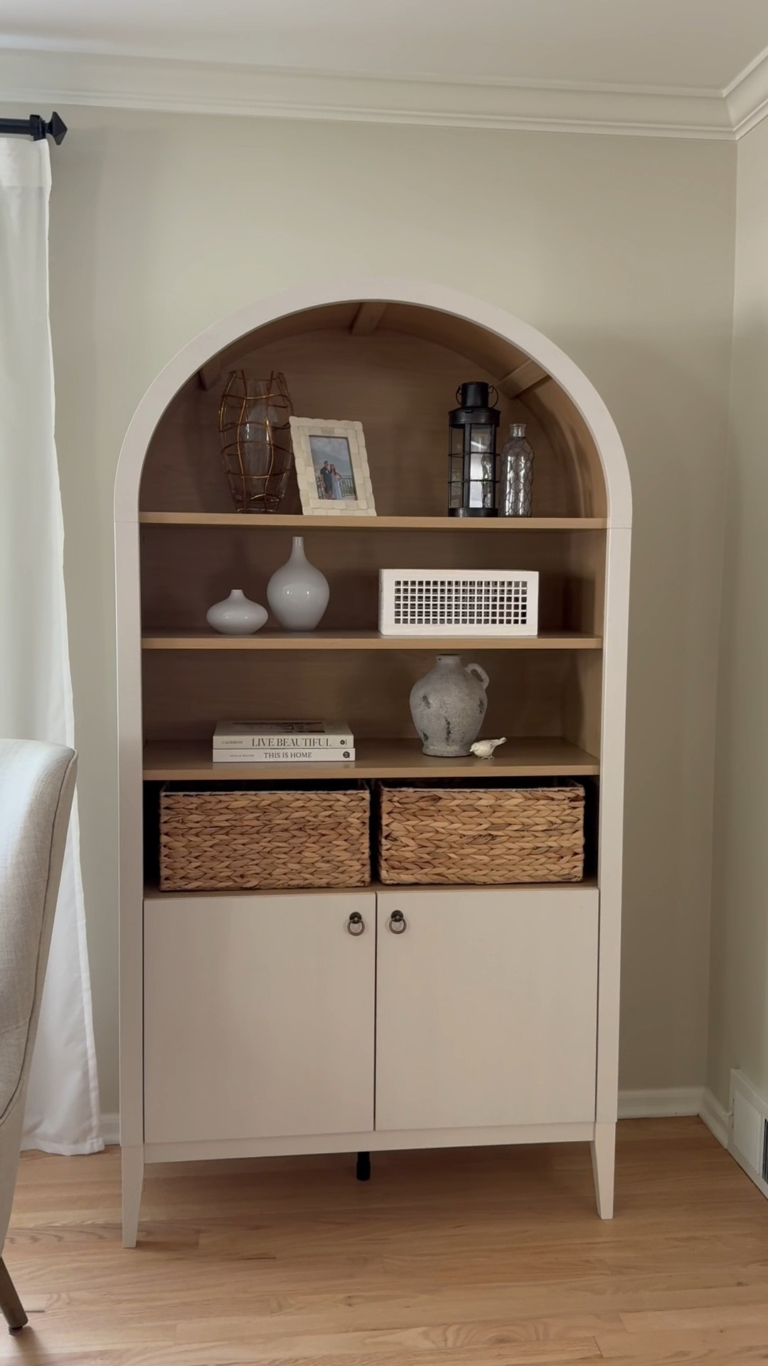Added this arched cabinet to my living room for storage for the incoming baby and all the things that will want to be hidden. Bonus it’s on sale!!

Home decor. Neutral home design. 

#LTKHome #LTKSaleAlert