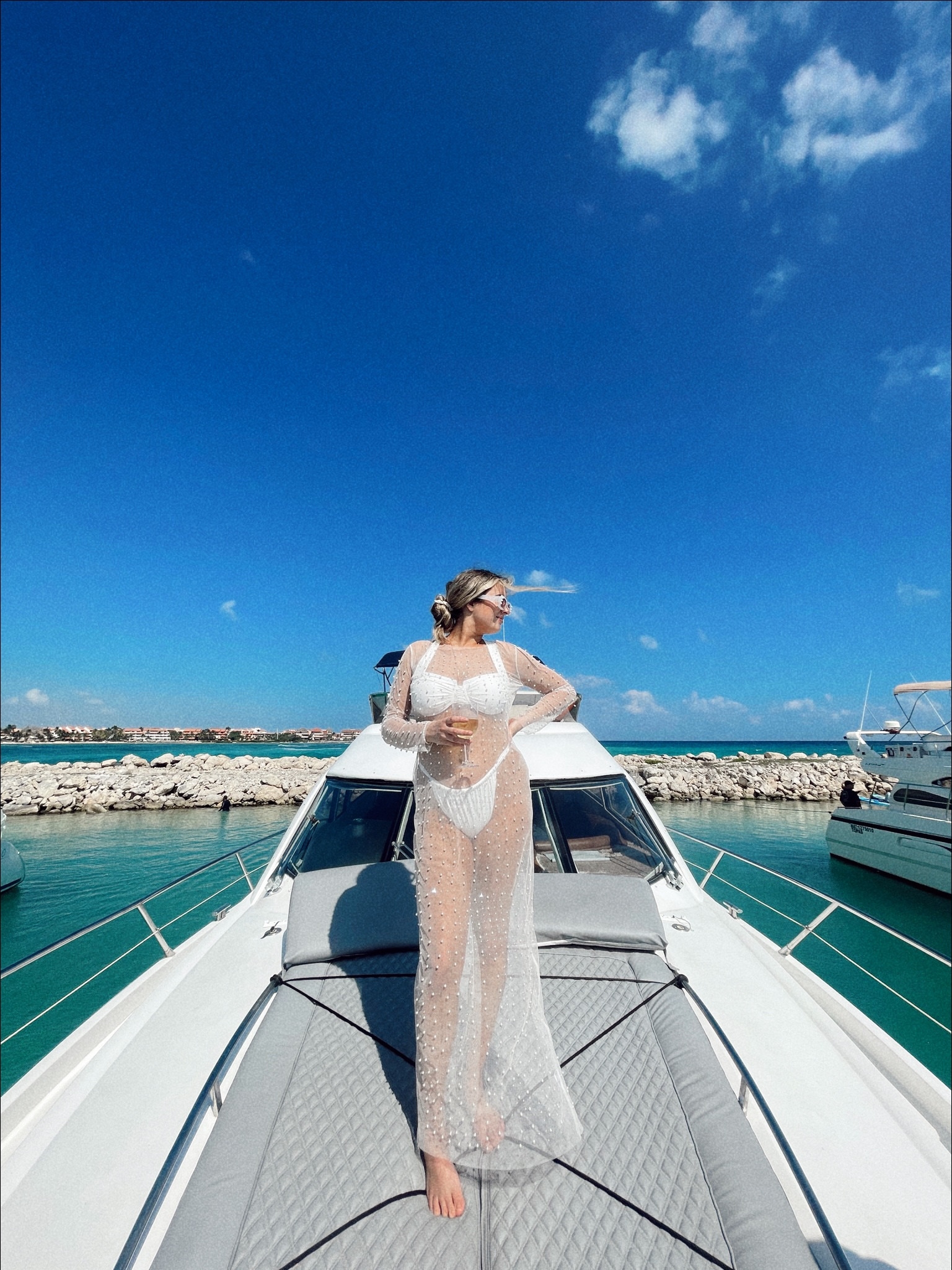 Bachelorette party outfit inspo 🫶🏼 obsessed with this Pearl swimsuit cover up I wore on yacht day in tulum, Mexico! Perfect for brides looking for white outfits. 

#LTKswim #LTKwedding #LTKtravel