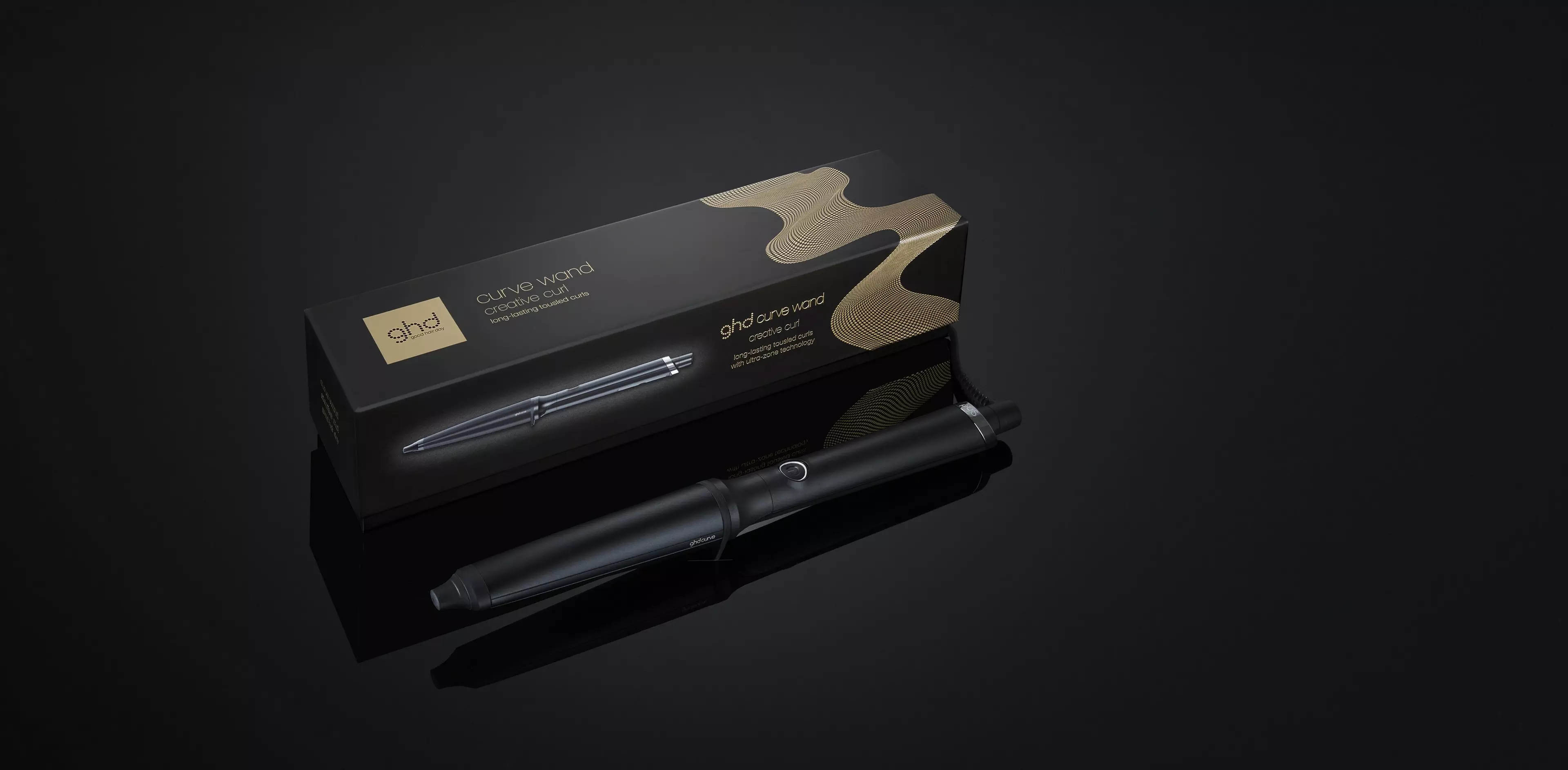 GHD CREATIVE CURL - TAPERED CURLING WAND IN BLACK | ghd (US)