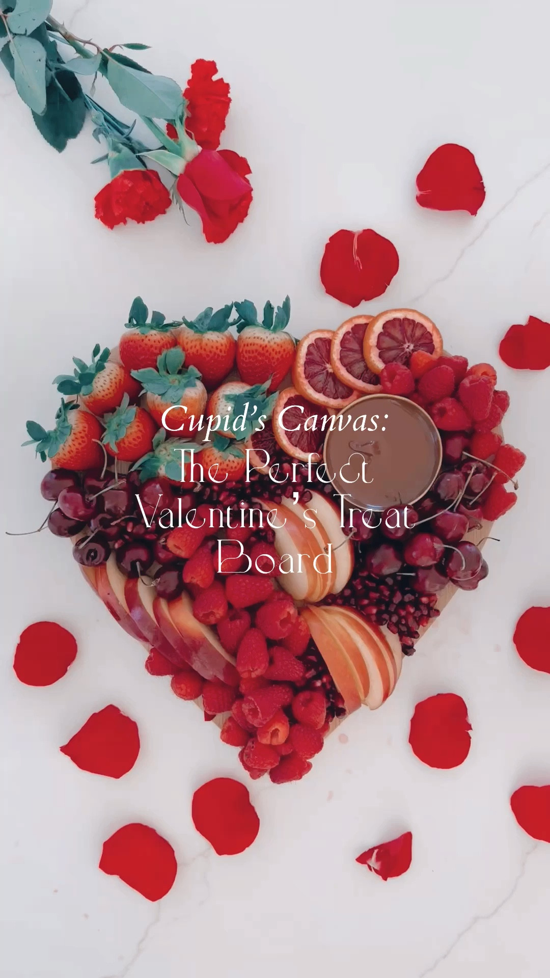 Here’s my delightful board for Valentine’s Day – it’s the perfect blend of elegance and ease, yet it looks stunningly elaborate and oh-so-sexy. Isn’t Valentine’s the ideal night for a little indulgence? I opted for a charming, simple heart-shaped board and had fun with an array of red fruits. The key is to start with a frame and then let your imagination take over in filling it up. Creating symmetry adds a touch of finesse – mirror a fruit on one side with its counterpart on the other. I sprinkled pomegranate seeds for a splash of color and texture, and then, the grand finale – chocolate. Because what’s Valentine’s without a hint of chocolate indulgence? And hey, if you’re celebrating solo this Valentine’s, that’s totally fine. This board is all about treating yourself – no sharing required! 😉 Until we meet again, stay splendid! 💫✨💫 Want to create your own? 

#LTKSeasonal