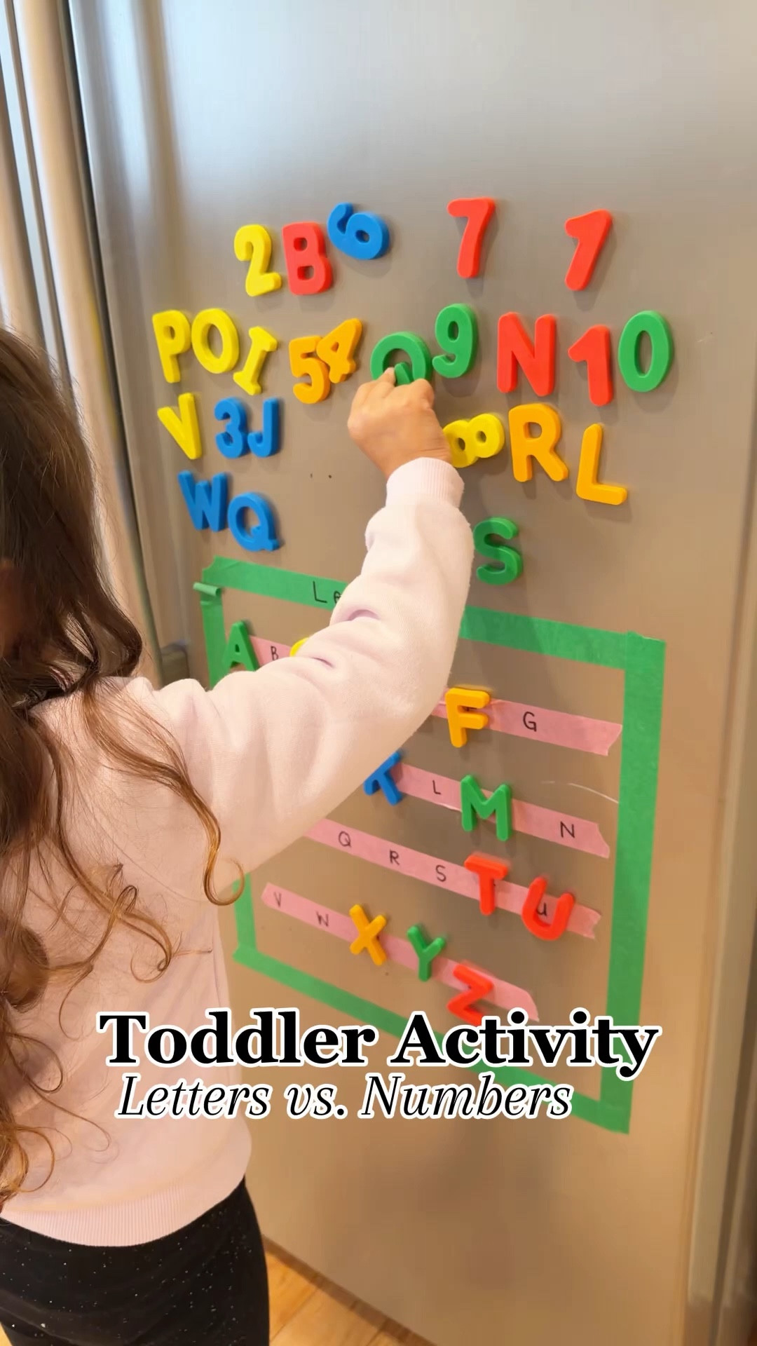 Comment LINK 💌✨🔤🔢 and I’ll DM you everything I used for this activity!

Learning the difference between letters and numbers doesn’t have to be complicated. Sometimes the simplest activities turn into the biggest learning moments. 💡

I used colored painter’s tape 🎨 on the fridge to create two boxes — one for letters 🔤 and one for numbers 🔢. Then I added strips of tape inside each box with the letters and numbers written on them. At the top, I placed magnetic letters and numbers for my daughter to choose from.

Her job was to decide:
✨ Is it a letter or a number?

Then she matched it to the correct spot on the tape!

For example, if she picked the letter A, she found the A inside the letter box and placed it there.

This activity is great for:
• 🔤 Letter recognition
• 🔢 Number recognition
• 🧠 Early sorting skills
• 👶 Simple independent play

Plus… doing it on the fridge makes it feel extra fun and interactive! 🧲

#LTKKids #LTKdayinmylife #LTKmomlife