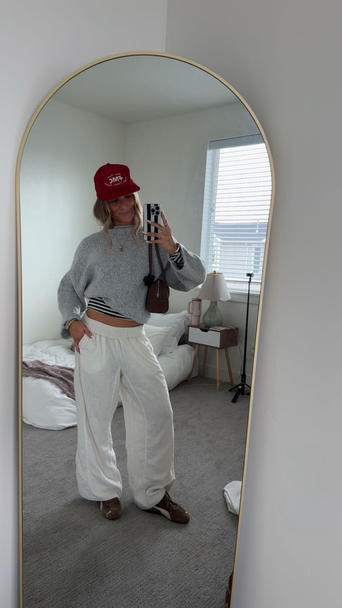 hat is thrifted, sweater is thrifted, striped undershirt is Brandy Melville!