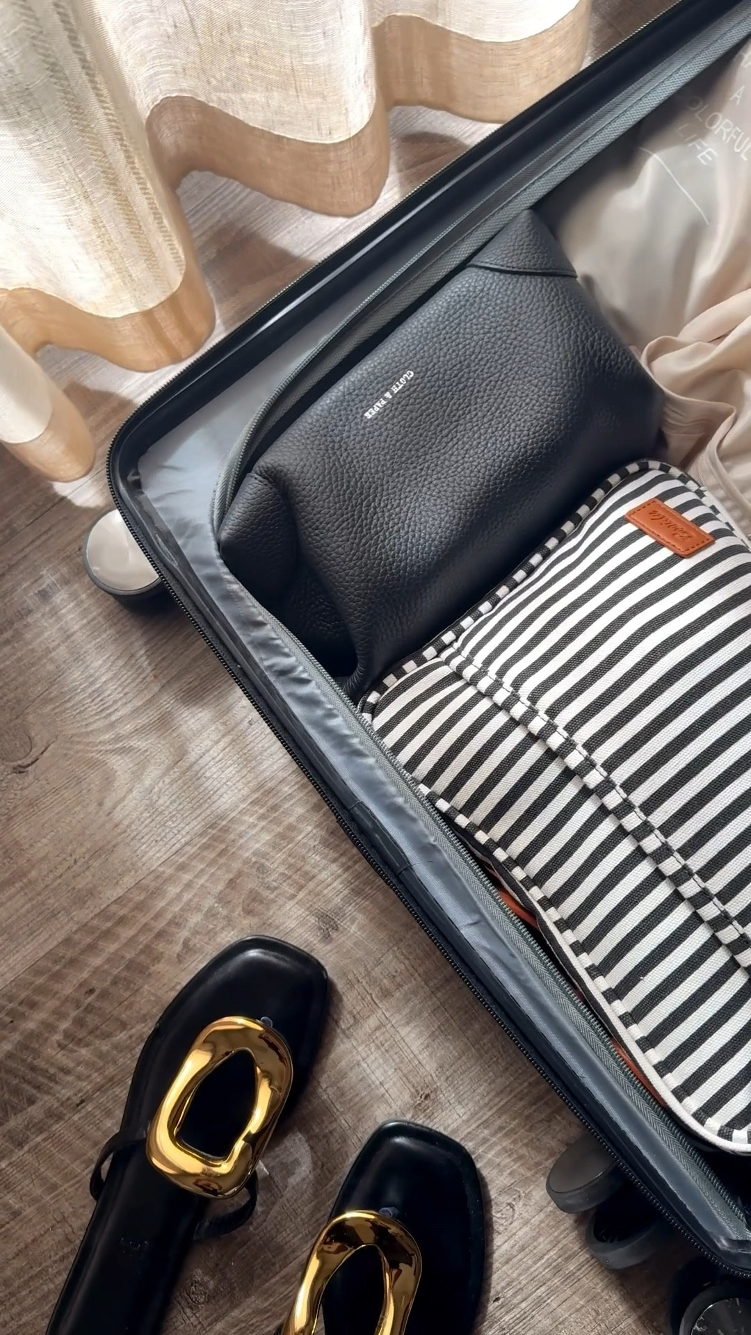 Here are some of my favorite travel organizers featuring this leather pouch from @clothandpaper that I’m hoping makes a comeback fir the holiday season 👀🫢 

#LTKTravel #LTKFindsUnder100 #LTKItBag