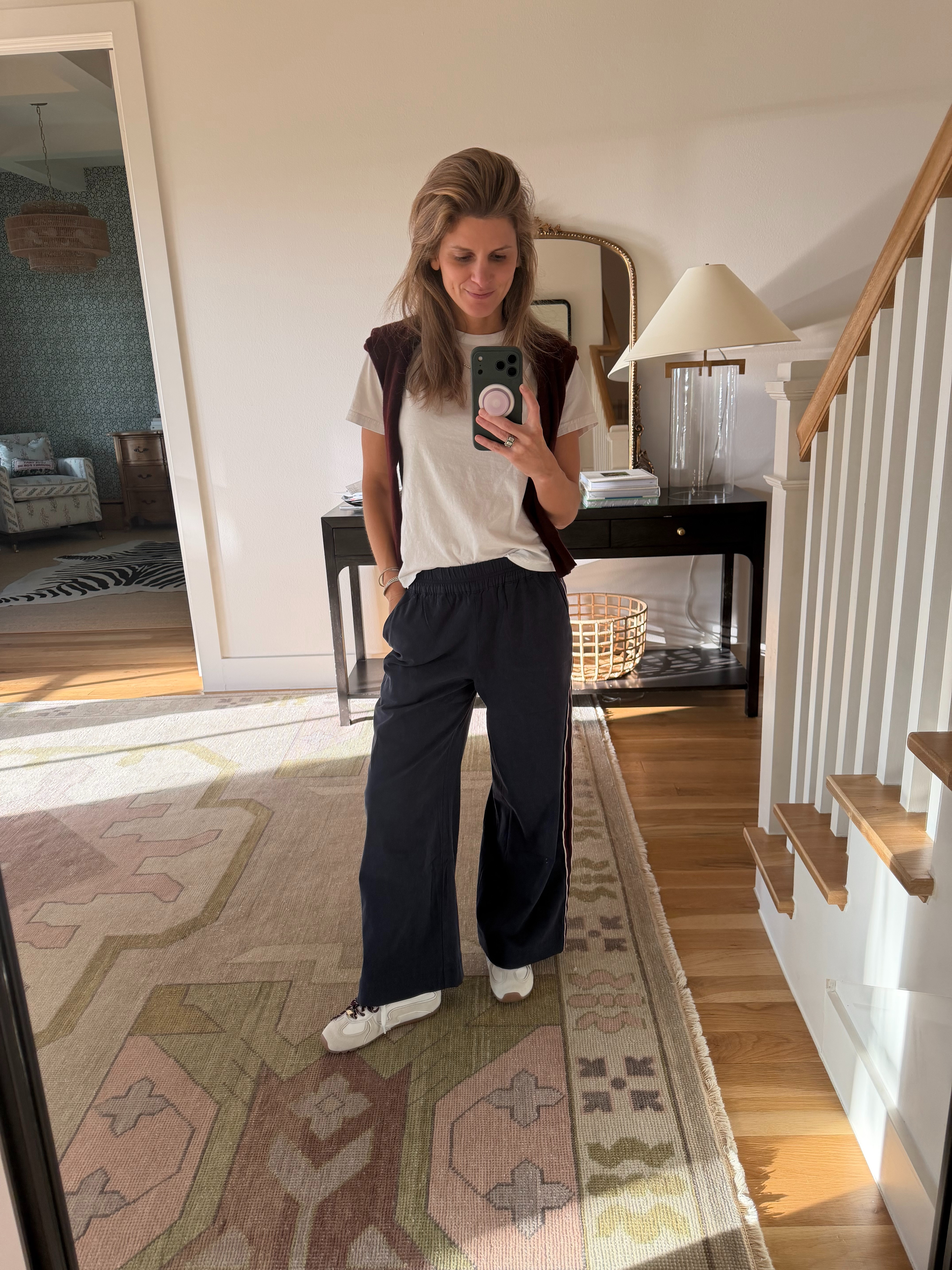 Navy and burgundy with a little white. My easy fall uniform right now, and so comfy for running around. Tee, track pants, sweater on the shoulders, done.

leset white crewneck tee · wearing XS.

quince  burgundy sweater · wearing XS. Draped over my shoulders for when it gets chilly.

marine layer navy wide-leg track pants · wearing XS. Pull-on with the side stripe.

Fall outfit · mom outfit · errand outfit · weekend outfit · track pants · wide leg pants · white tee · burgundy sweater · navy and burgundy · white sneakers · elevated casual · comfy outfit 

 