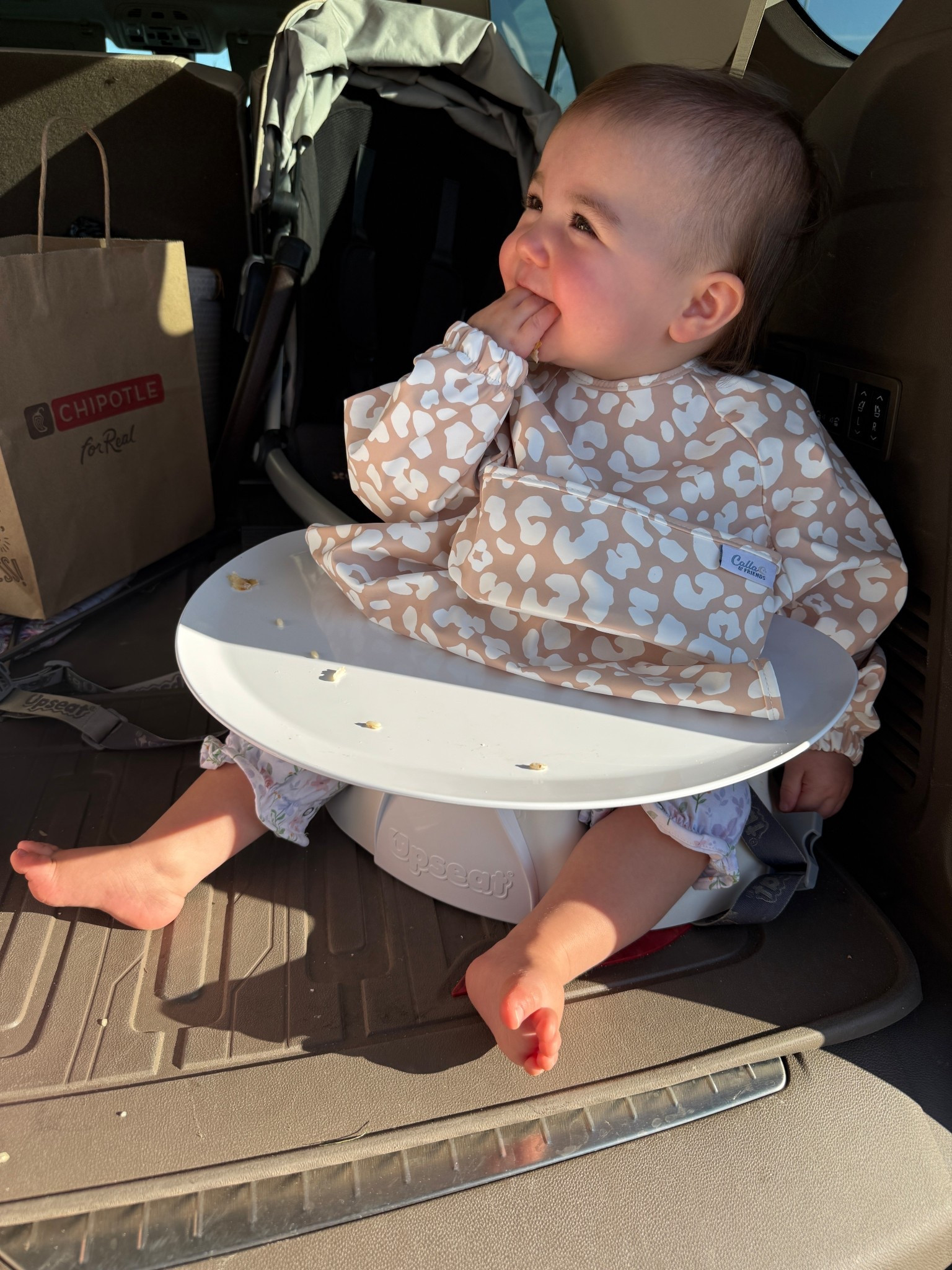 Upseat for the win! Felt so thankful to have this in the back of the car when we needed to have a quick car dinner before our cousins baseball games! And we always have our @Calla & Friends Grayson Long Sleeve Bib in the diaper bag!! 

#LTKKids #LTKBaby #LTKmomlife
