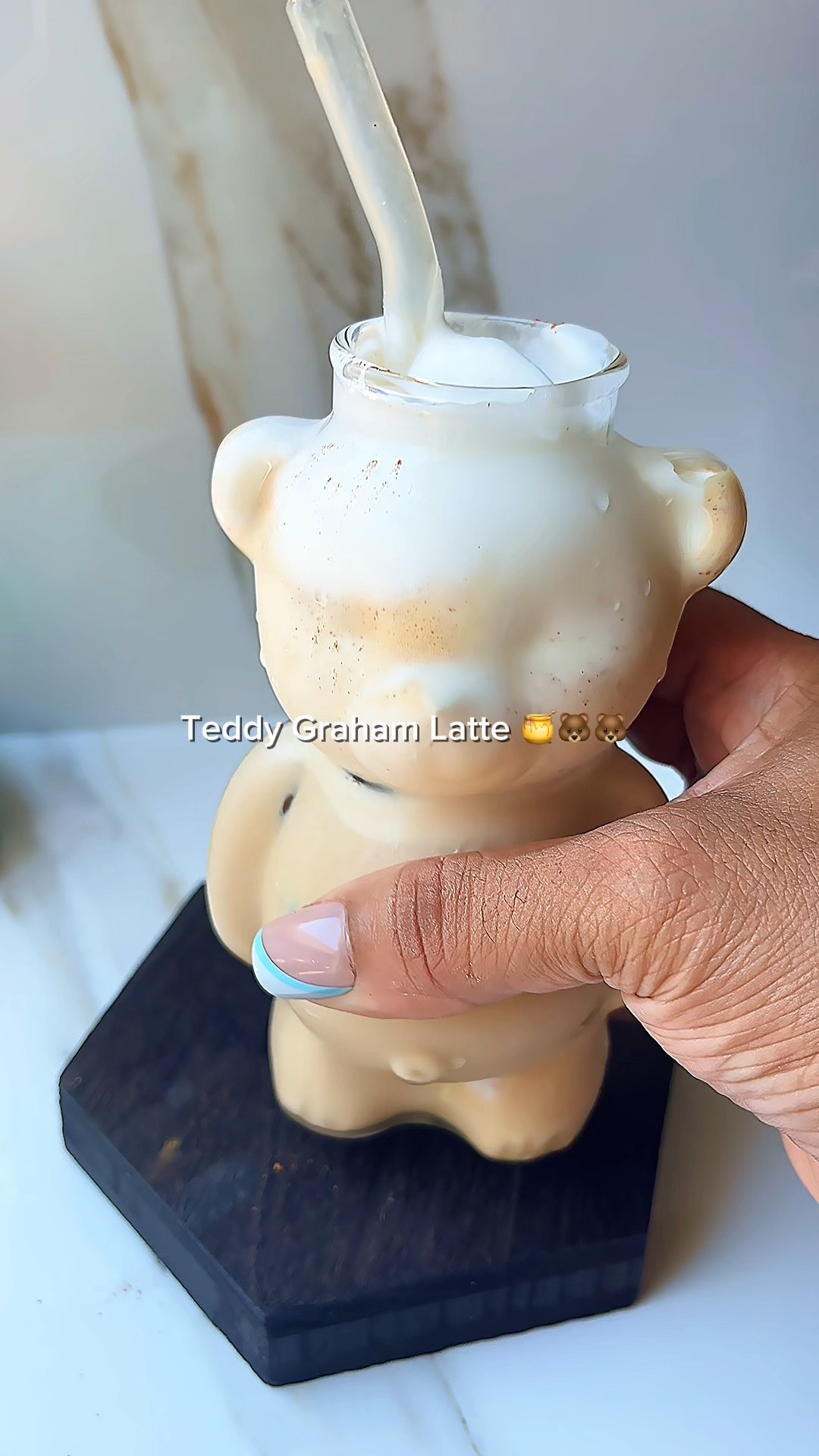 Okay let’s do this! I’m walking you through how I make my Teddy Graham latte. This Teddy Graham latte walked straight out of snack time and into my iced coffee era 🐻☕

Cinnamon, brown sugar, honey and espresso. Poured over icy milk then topped with cold foam and a cinnamon dusting.

Yes I served it in my teddy cup because why not?

It’s sweet cozy and just nostalgic enough to feel like a hug in a glass
Would you sip this? 


#LTKFindsUnder50 #LTKOver40 #LTKHome