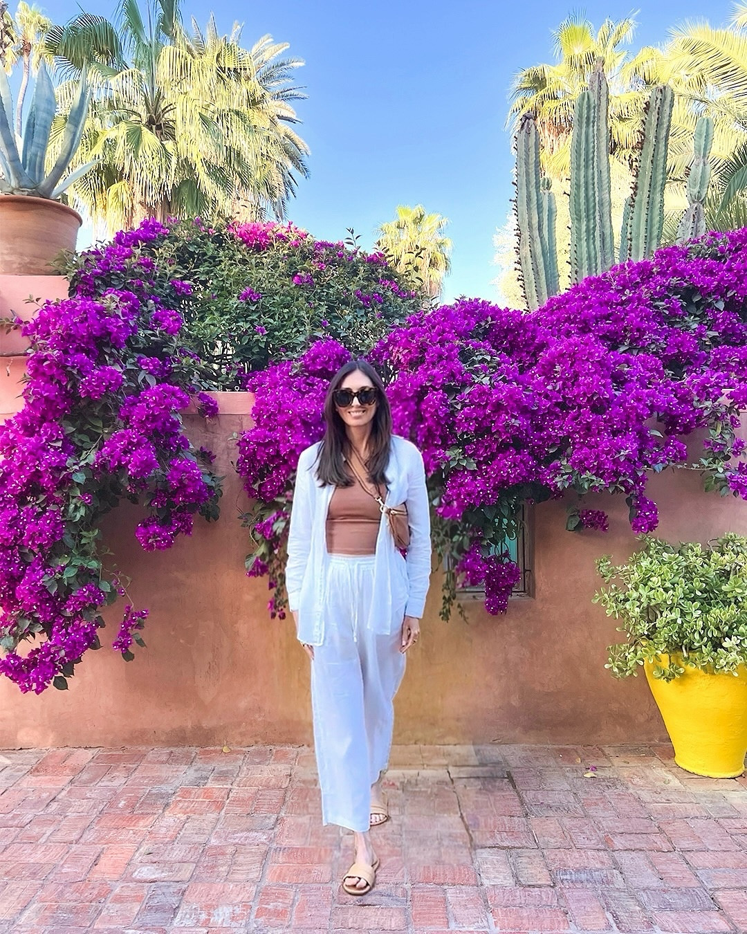 what i wore in marrakech to the gorgeous jardin majorelle. 

wearing xs in button down and pants (regular length).

this quince bag proved perfect for travel - i used it the entire trip, other than at a few nicer dinners.

🌺🍊🌵💙🌸🍋

#LTKItBag #LTKSeasonal #LTKTravel