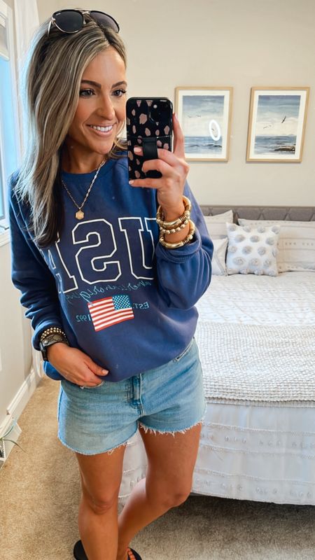 Love this USA sweatshirt & the inside is insanely soft! 🇺🇸 Such a cute summer sweatshirt- I went TTS, wearing small 

These denim shorts I grab fit all the time. I size up 1 in them 

#LTKStyleTip #LTKSaleAlert #LTKFindsUnder50