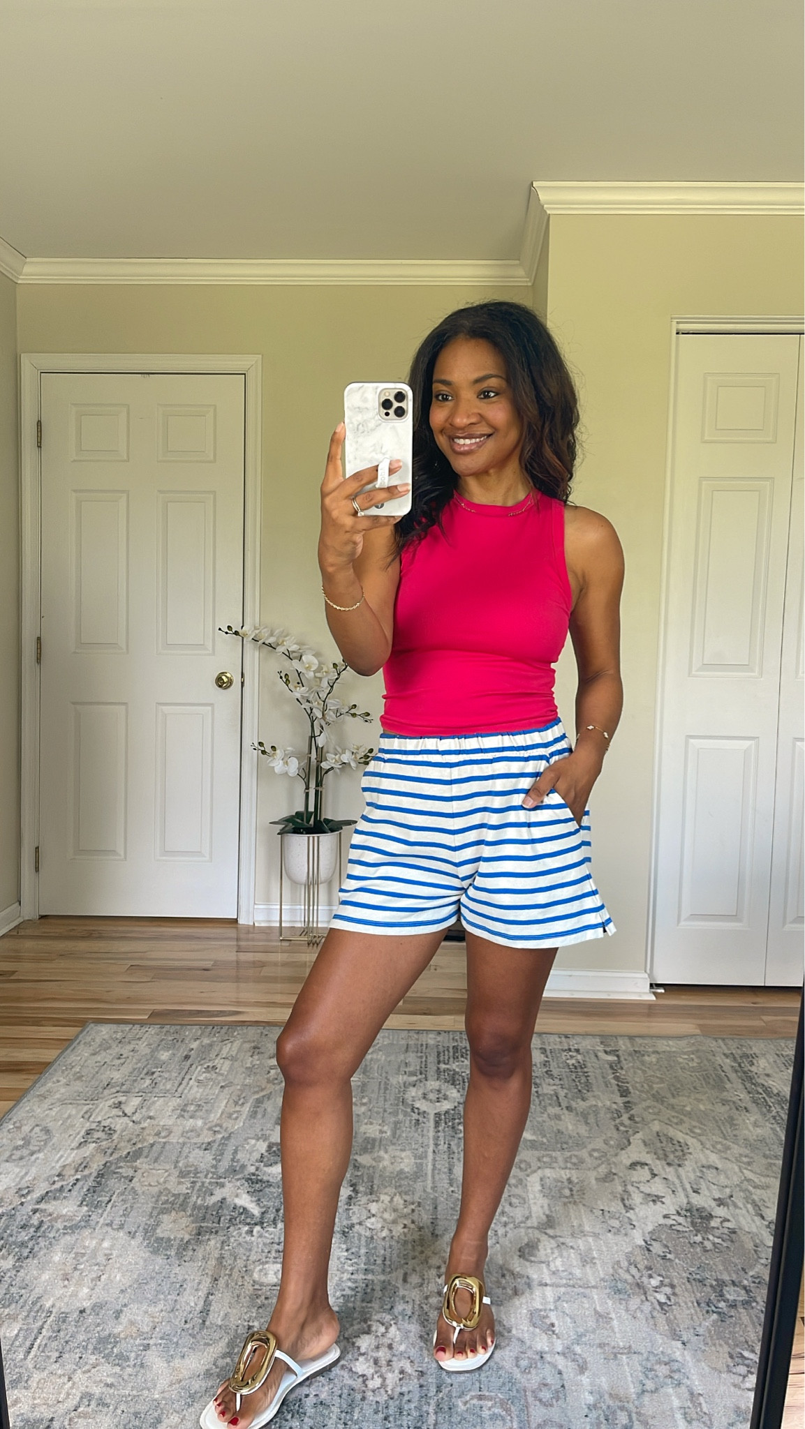 Wearing a medium in the top (I recommend sizing up at least two sizes if you have a large cup size like I do). And wearing a small in the shorts which are TTS  

#LTKOver40 #LTKootd #LTKgrwm