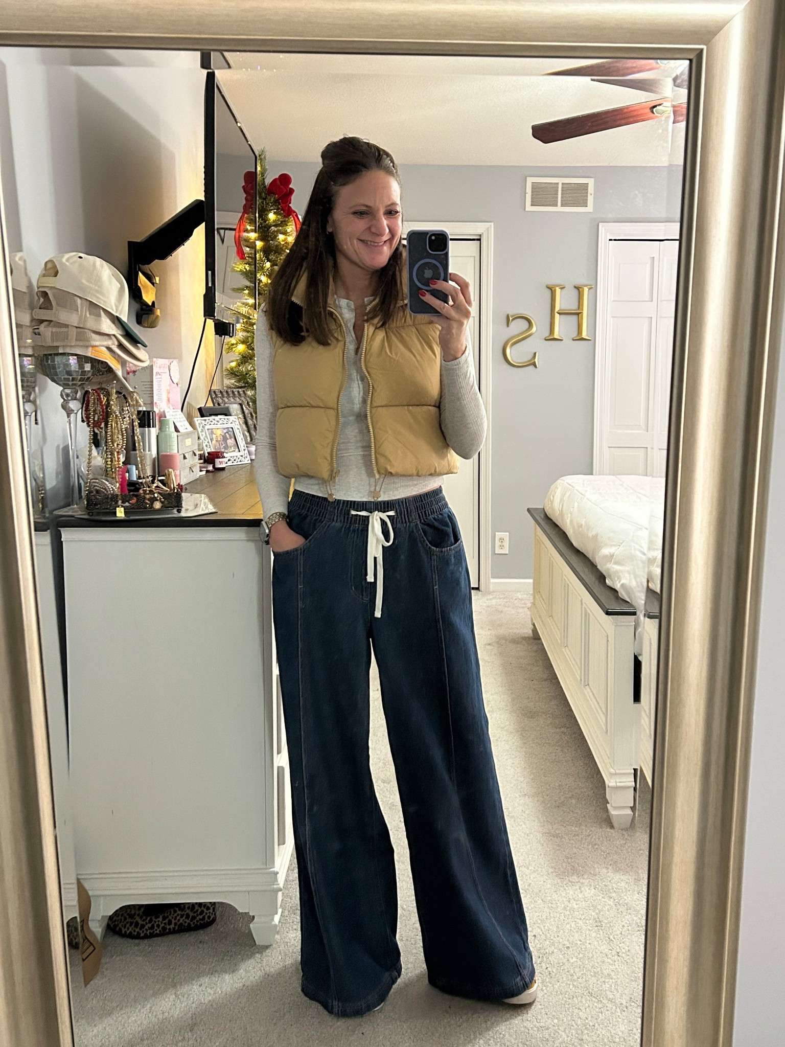 Last night's casual out to dinner look with the family. I always love throwing on a vest to complete a look, plus as an added bonus, 
they keep you warm! 🔥 

With such a wide leg in these jeans, I keep the look from coming off to bulky by wearing a slimmer henley top and a crop vest instead of a longer one. Threw on my favorite Nike court legacy sneakers to match my son ☺️ and out the door we went! 🍝 

#LTKCyberWeek 

#LTKSaleAlert #LTKmomlife #LTKTall