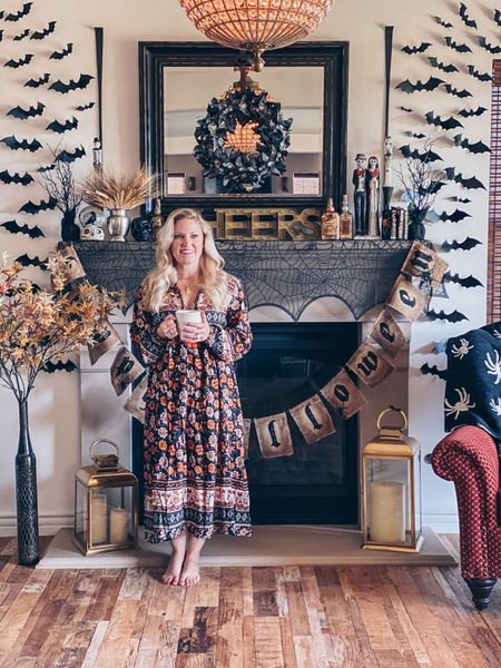 This is my favorite room to decorate for Halloween.  All of the bats make it so much more dramatic.  Tip: use painters tape.  The tape it comes with will take the paint off of your wall. Dress is $30 and runs tts (wearing a small).  

#LTKhome #LTKHalloween #LTKSeasonal