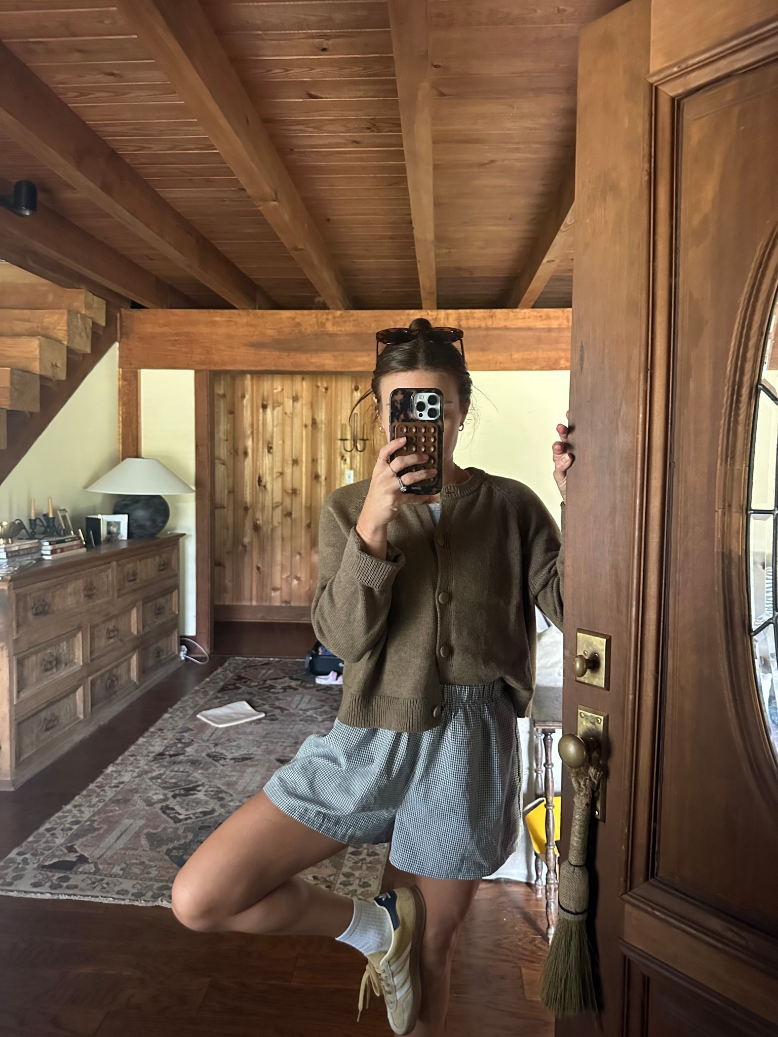 I used to hate the part of summer where it’s almost fall but not really it’s like fake fall. But these days I’m really leaning into transitional fall outfits like these gingham shorts and brown sweater! Plus these yellow adidas really seal the deal for me 🤌🏽

#LTKPetite #LTKSeasonal #LTKFindsUnder50