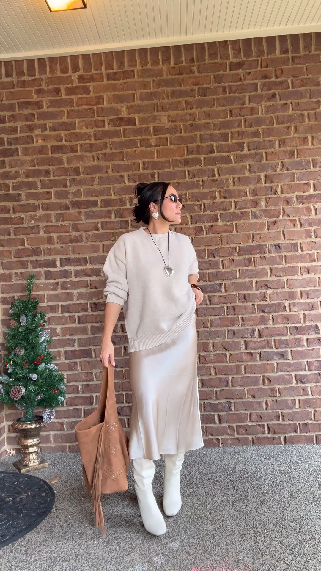 Small in the silk skirt. TTS. It is a true midi length on my 5”2 frame. Got medium in the sweater for a more oversized fit, but it’s TTS. 

#LTKootd #LTKHoliday #LTKPetite