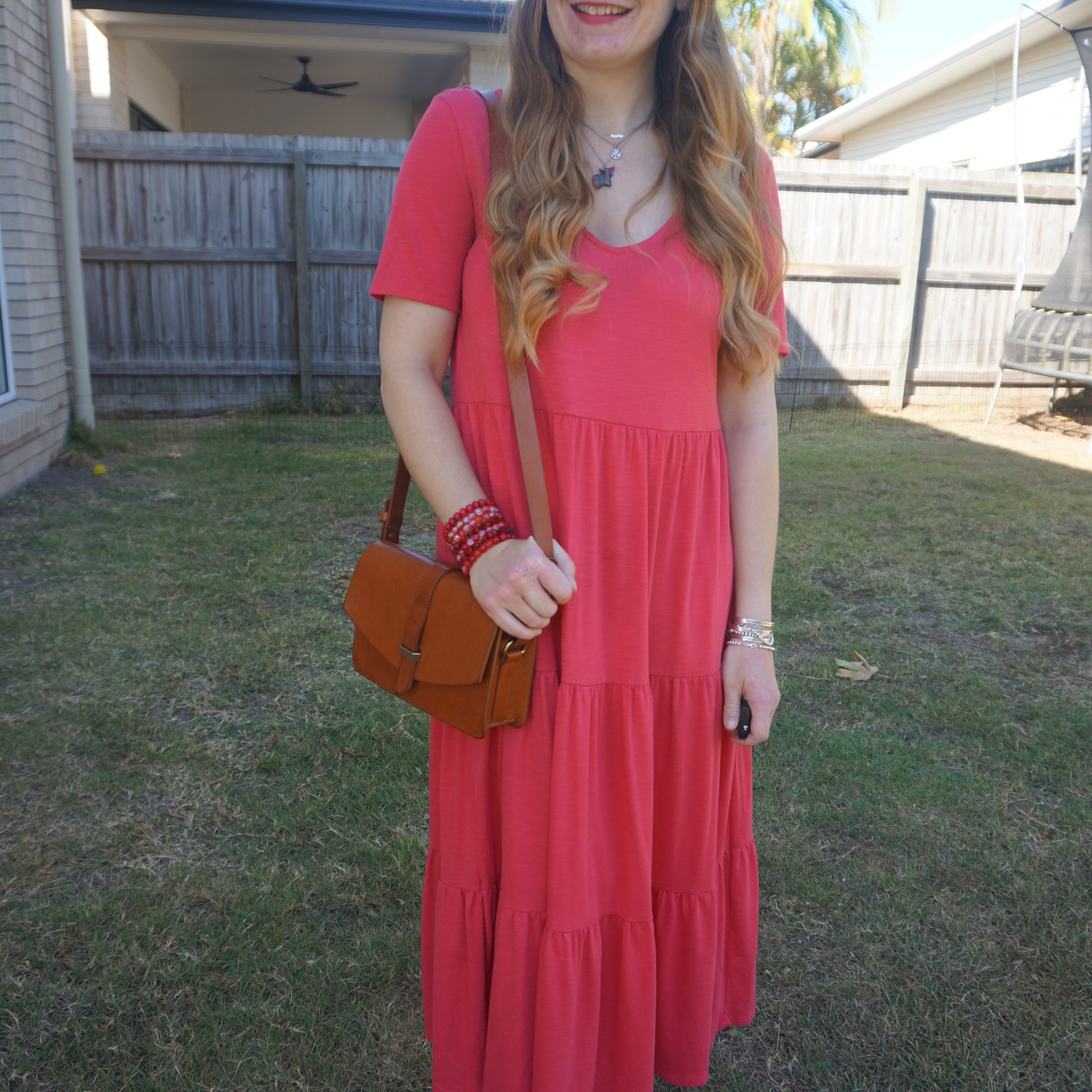 Kmart Anko tiered midi dress with red beaded bracelet stack and vintage Sezane bag ❤️

#LTKaustralia #LTKspring