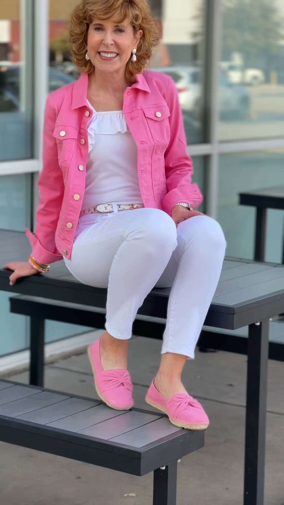 This pink denim jacket is a wardrobe staple for me! (On sale right now!) It coordinates perfectly with my pink espadrilles. I’m wearing white No-Stain Girlfriend jeans (Yes! They’re actually treated to be stain-resistant - which is great for a spiller like me!)

Underneath I’m wearing a darling ruffled tank from Amazon- it’s affordable and comes in loads of colors! 

I finished off with pearl drop earrings and a vintage designer belt.

#LTKshoecrush #LTKSeasonal #LTKsalealert