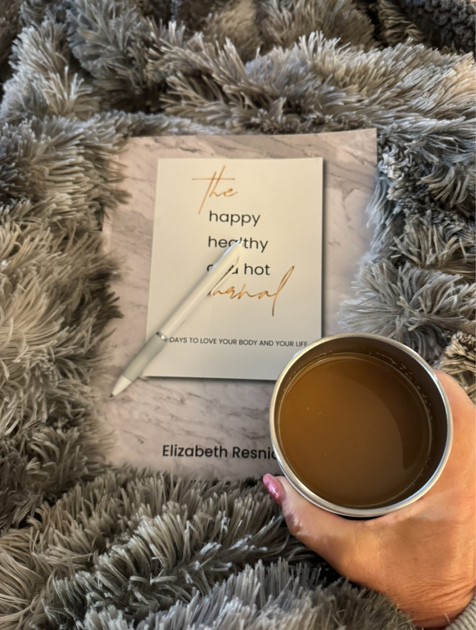 I love my cozy morning routine. After taking Tyson out for a walk I get back in bed (so does Tys!) and sip my smart/sexy coffee while I do my journaling. Now that the mornings are chilly this yummy blanket makes it even better. And was just thinking- all of these items make amazing gifts- the furry throw, the insulated wine tumbler (that I use as a coffee mug) and of course The Happy Healthy and Hot Journal ;)

#LTKhome #LTKover40 #LTKGiftGuide