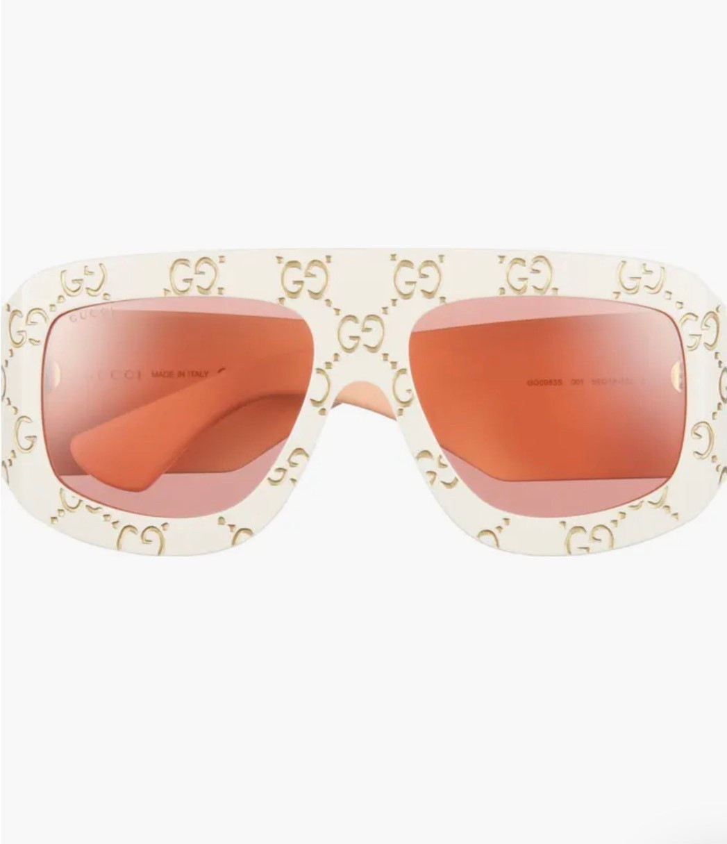 Gucci

59mm Shield Wrap Sunglasses

Gleaming logos bring signature Gucci flair to shield wrap sunglasses that'll protect your eyes while adding a statement pop to your look
