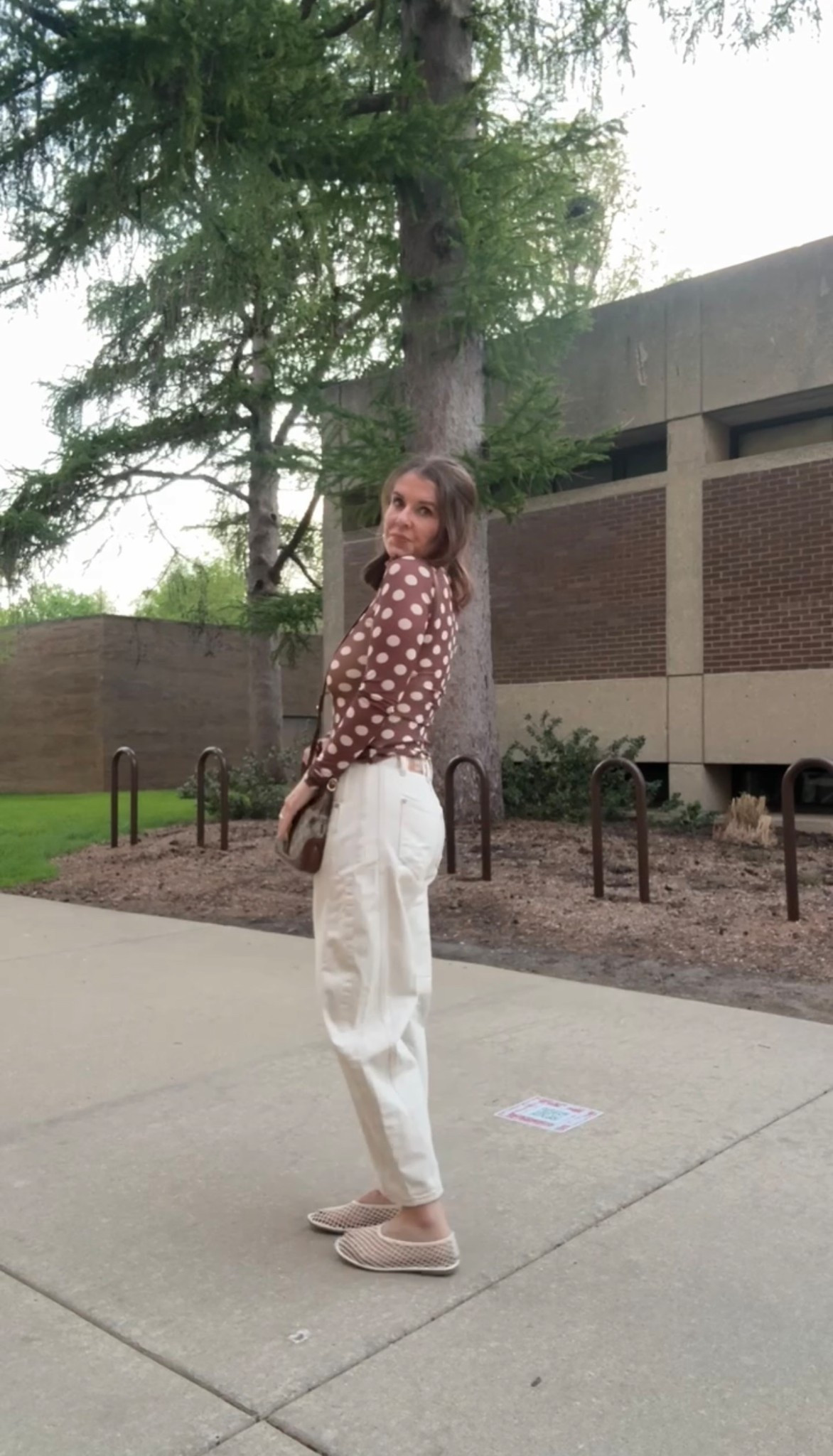 Free People barrel jeans. Comes in a lot of colors. Run a little big. I am wearing a 24. ￼ Sheer top from revolve only $37. Runs TTS wearing small.  Crochet mesh ballet flats from target run TTS.  

#LTKPetite #LTKSaleAlert #LTKOver40