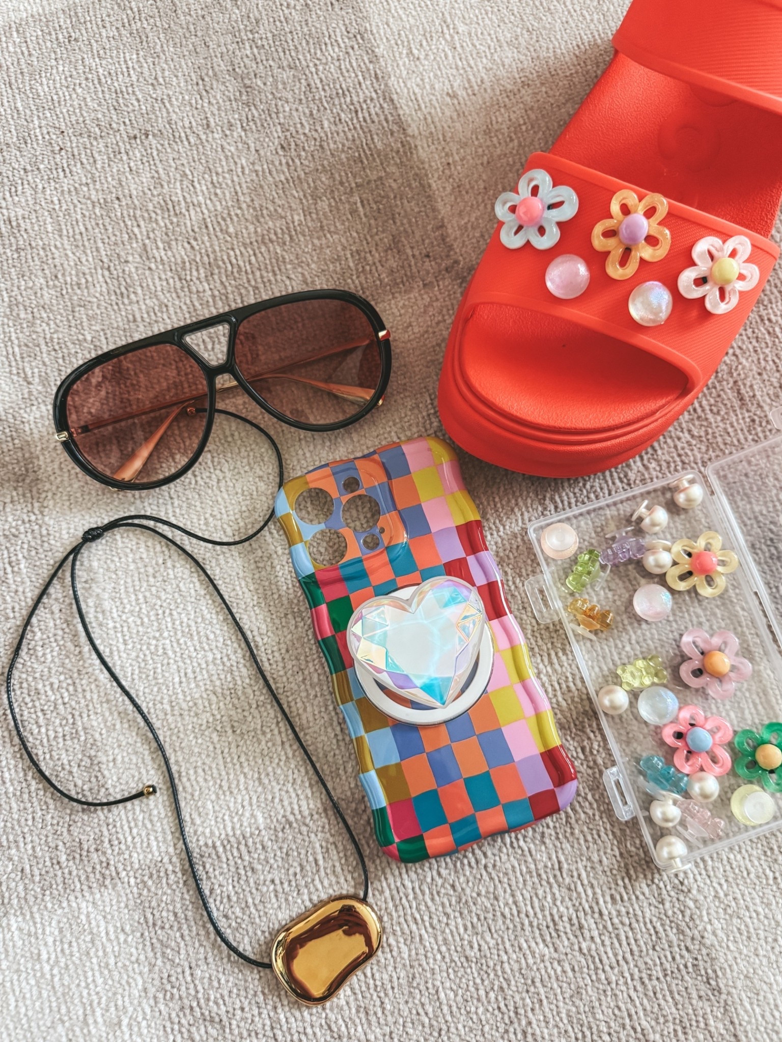 Some of my new Amazon finds. 
New iPhone case that’s so cute! I added the heart pop socket. These charms for my crocs are so adorable!!
