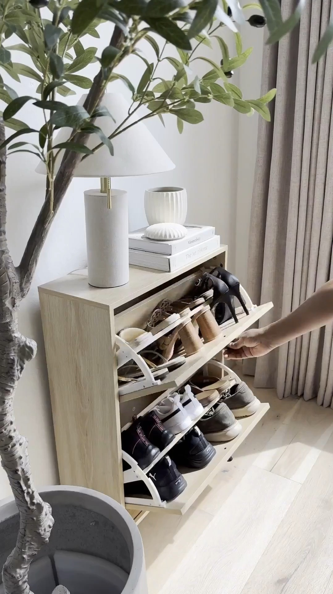 Double win! 🎉 Create an entryway that's both functional AND stylish! 💡 I'm obsessed with these slim stage cabinets - only 9 inches deep and 23 inches wide, making them perfect for cozy entryways. Plus, you can place them next to each other to create more space! 🎉 The best part? You can store your shoes sideways or forwards, whatever works best for you! 👠👡

#LTKStyleTip
#organized #LTKHome #LTKSaleAlert
