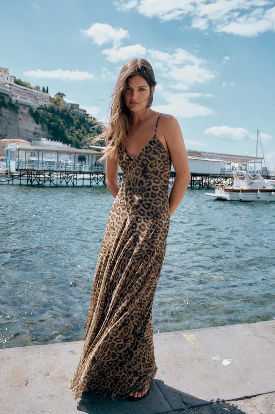 Long dress with V-neckline and adjustable spaghetti straps. Tonal matching interior lining. Godet... | Zara US