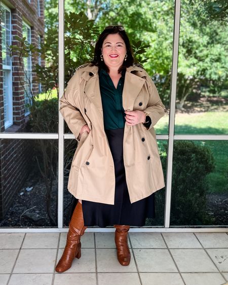 Plus Size fall outfit that will make you feel so chic. Wide width boots, a satin midi skirt, jewel tone button down top, and a classic tan trench coat  

#LTKplussize #LTKover40 #LTKSeasonal