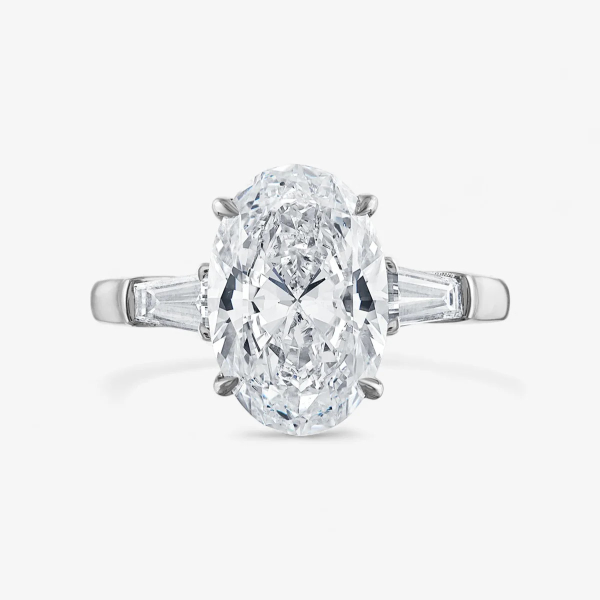 Oval Three-Stone with Tapered Baguette Side Stones Engagement Ring | Stephanie Gottlieb Fine Jewelry