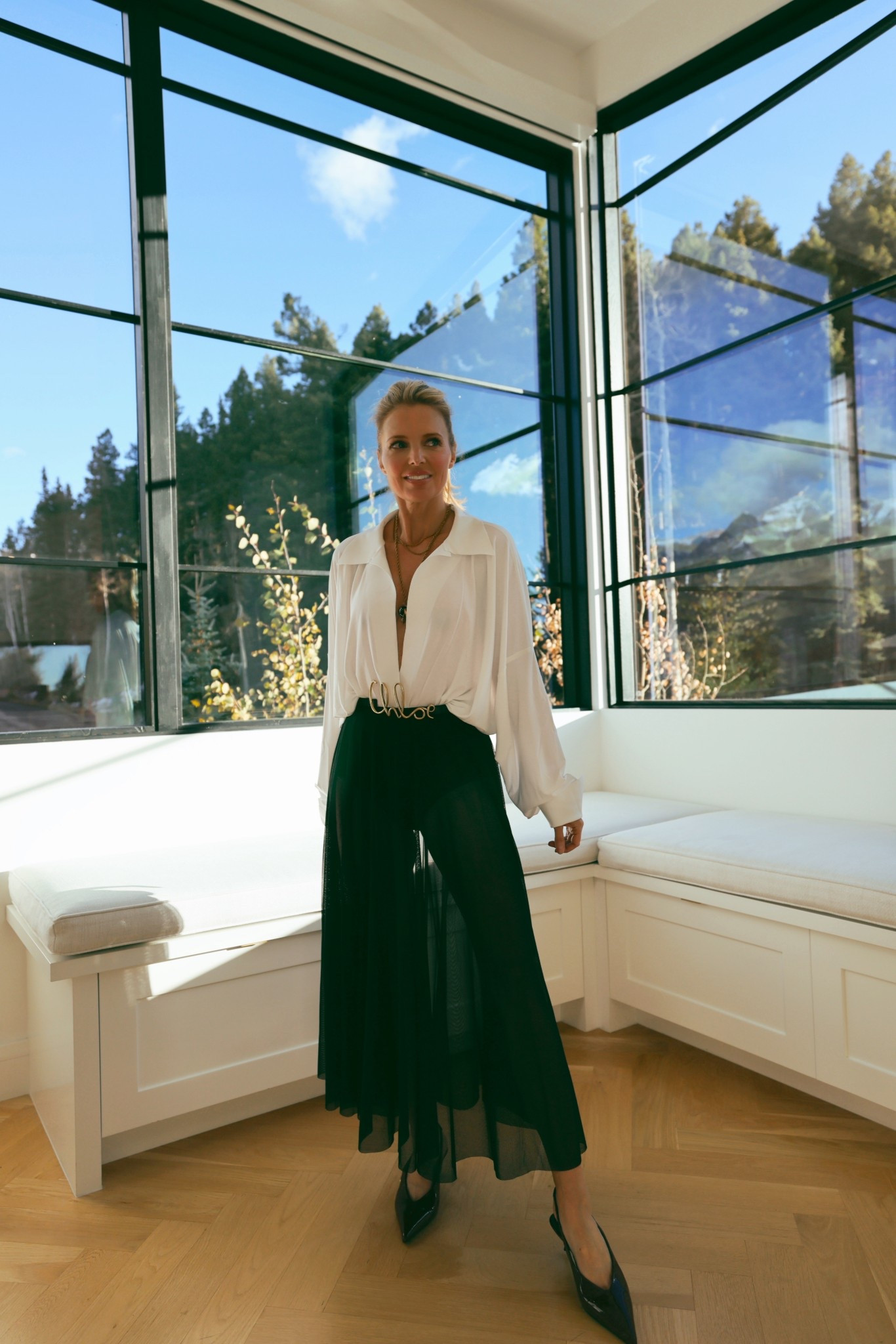 If you have a glamorous holiday party to attend or simply want to dial up the sexy this season, this outfit is so gorgeous and chic. The sheer skirt is quite avant-garde, but you could easily swap it for another black skirt or pants. 

#LTKHoliday