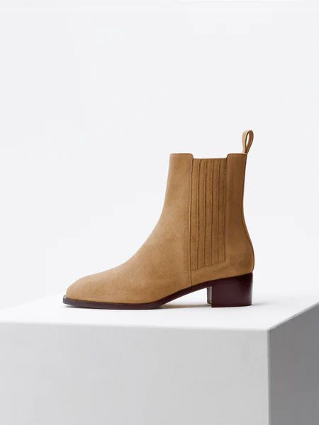 Signature ankle boot with elegant low block heel, rubber inlay, and sleek square tip | aeyde.com