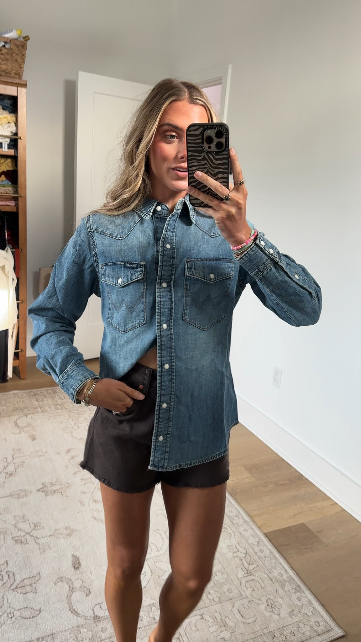 @Wrangler size small If you’re anything like us, there’s no such thing as too much denim. Our classic Women's Vintage-Fit Denim Western Snap Shirt features a regular fit silhouette that’s cut closer to the body than a boyfriend fit but still easy to layer if you need a little extra something. It’s crafted from 100% cotton for nonstop comfort. It also comes with all the heritage details, including flap chest pockets with the ‘W’ stitching, one-point yokes from front to back, and pearl snaps along the placket. Plus, you can leave it untucked or tuck it in to your favorite pair to create a double-denim look that’ll get you noticed.

#LTKootd #LTKSeasonal #LTKdayinmylife
